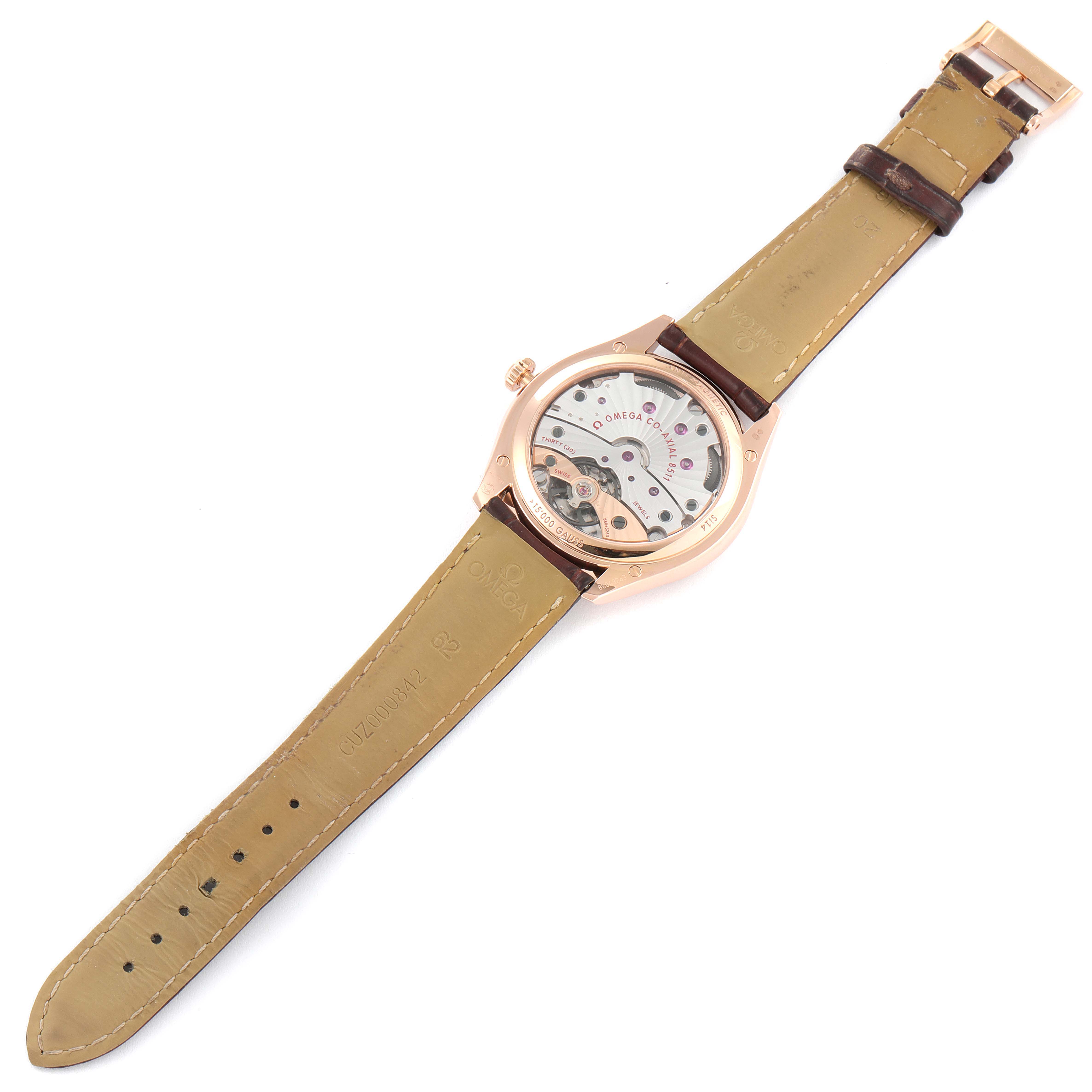 The image shows the backside of an Omega De Ville 432.53.40.21.02.002 Men's Rose Gold Silver Dial 432.53.40.21.02.002 Men's Rose Gold Silver Dial watch, highlighting the transparent case back and leather strap.