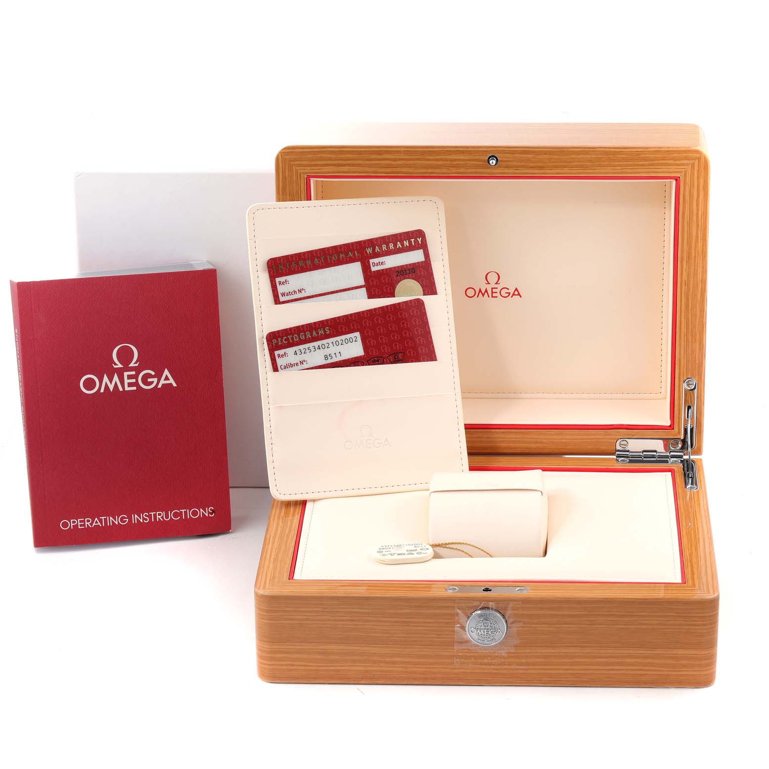 The image shows the Omega De Ville 432.53.40.21.02.002 Men's Rose Gold Silver Dial 432.53.40.21.02.002 Men's Rose Gold Silver Dial watch box, warranty cards, and operating instructions from a front angle.