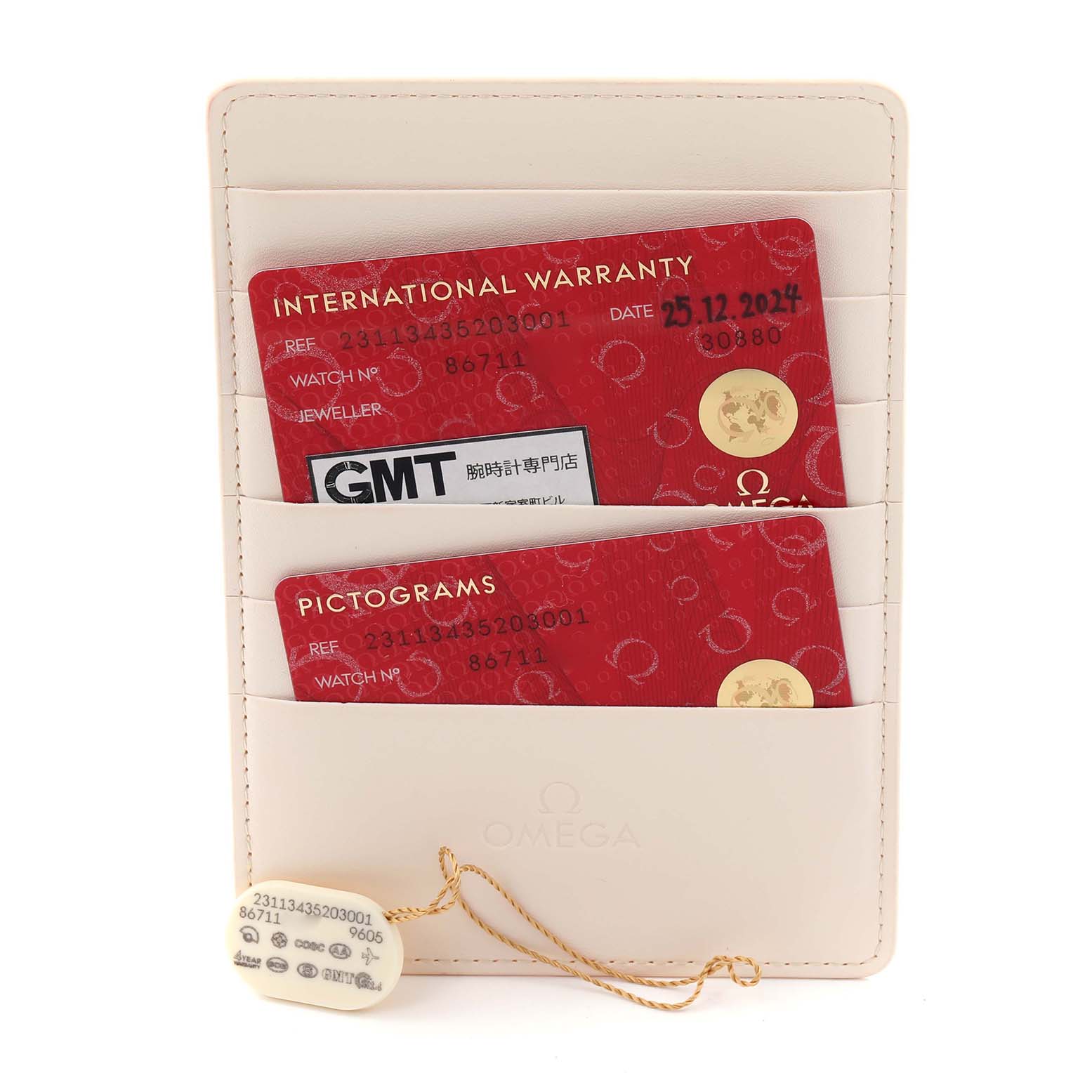 The image shows Omega Aqua Terra 231.13.43.52.03.001 Men's Stainless Steel Blue Dial 231.13.43.52.03.001 Men's Stainless Steel Blue Dial warranty cards and tags in a beige holder.