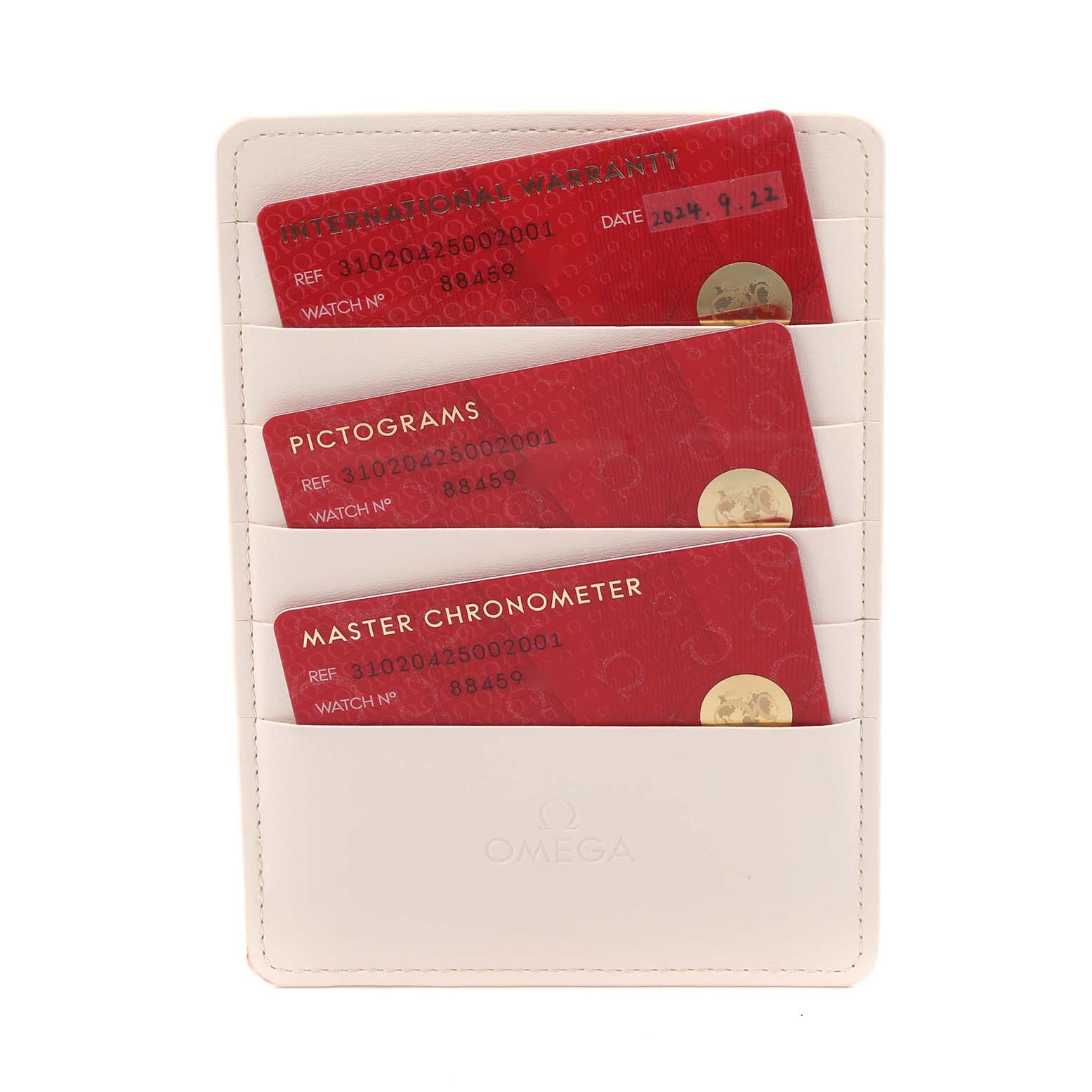 The image shows Omega Speedmaster 310.20.42.50.02.001 Men's Steel and Gold (two tone) Silver Dial 310.20.42.50.02.001 Men's Steel and Gold (two tone) Silver Dial model's warranty, pictogram, and chronometer cards in a holder.