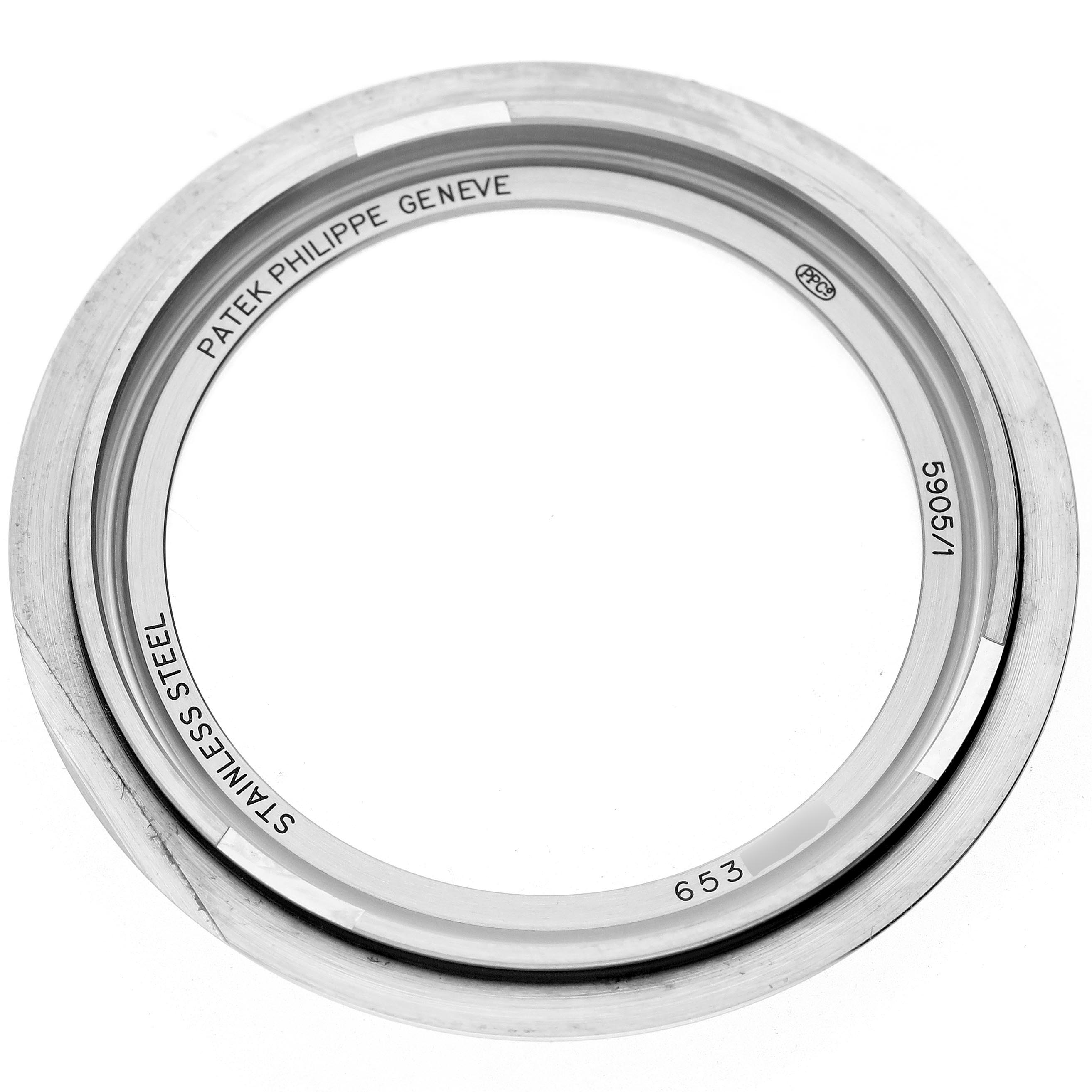 This image shows the stainless steel bezel of the Patek Philippe Complications 5905/1A-001 Men's Stainless Steel Green Dial 5905/1A-001 Men's Stainless Steel Green Dial model 5905/1 from a top-down angle.