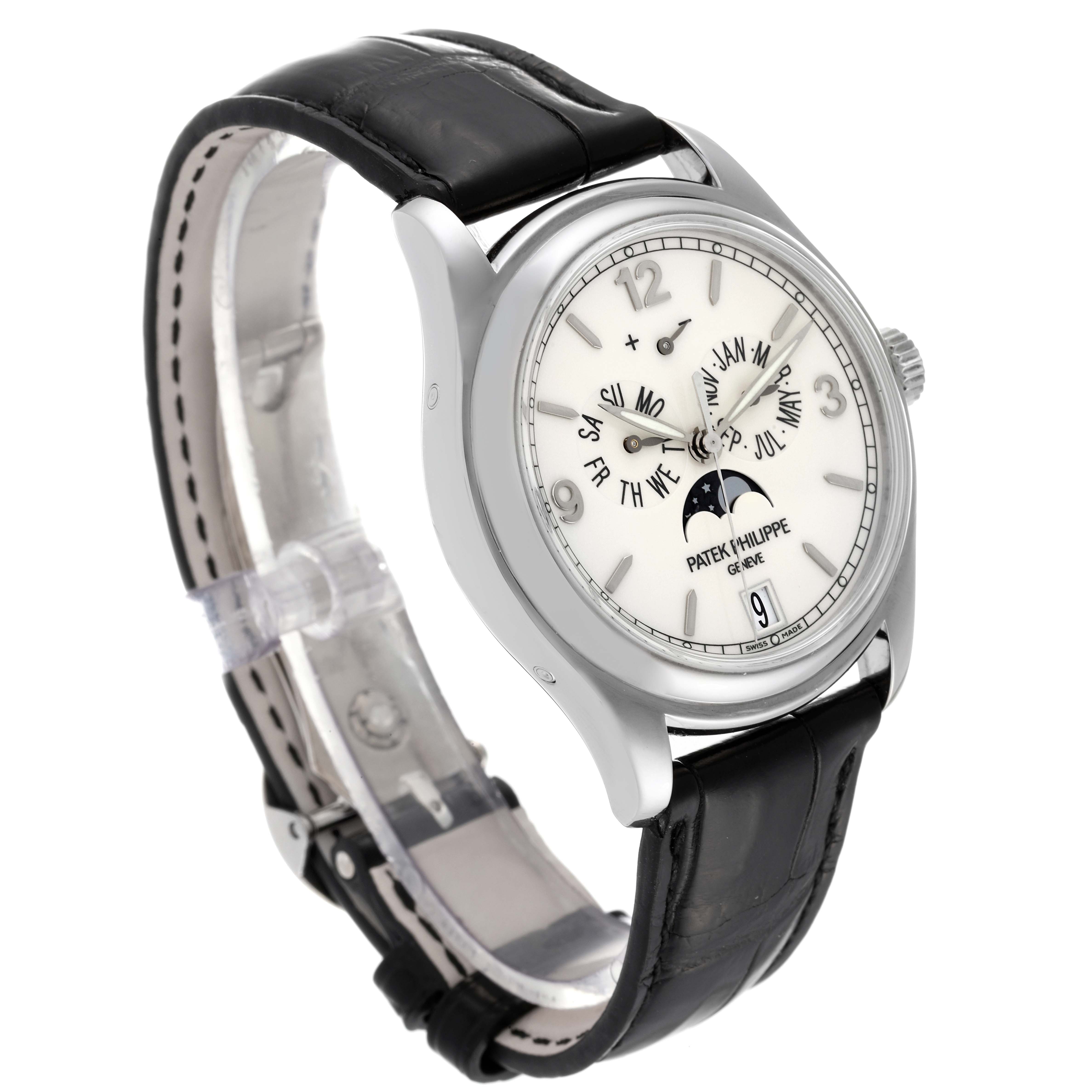 The image shows a side angle of a Patek Philippe Complications 5146G Men's White Gold Beige Dial 5146G Men's White Gold Beige Dial watch, highlighting its face, bezel, and leather strap.