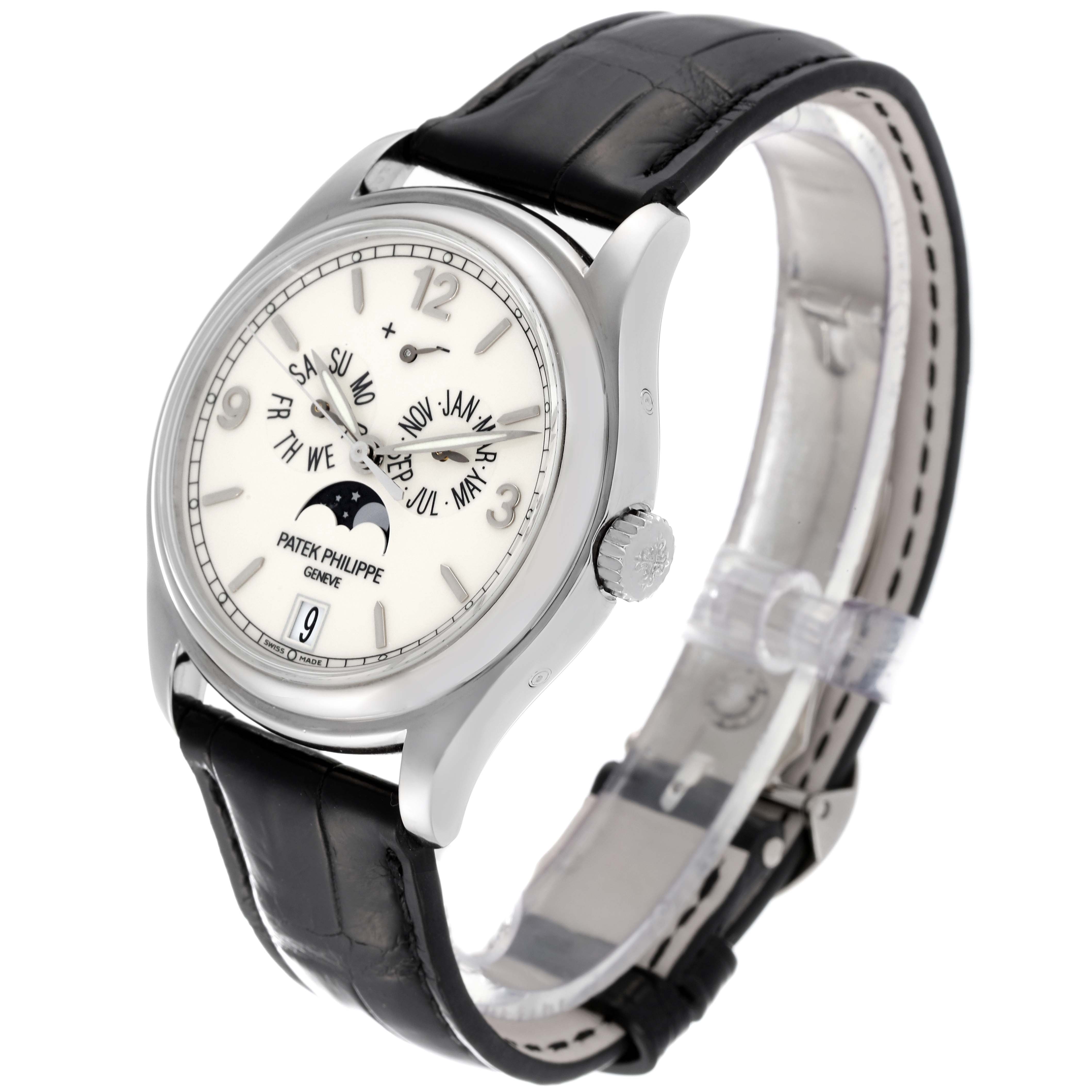 The Patek Philippe Complications 5146G Men's White Gold Beige Dial 5146G Men's White Gold Beige Dial watch is shown at a slight angle displaying its face, crown, and black leather strap.