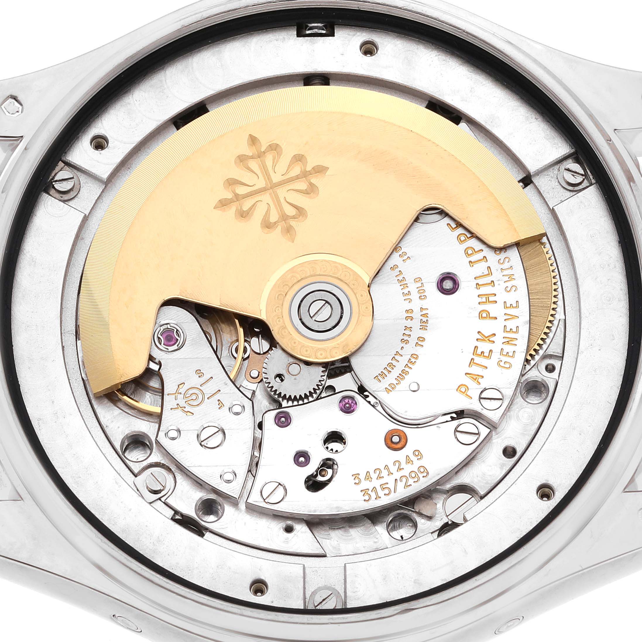 This image shows the inner movement and rotor of the Patek Philippe Complications 5146G Men's White Gold Beige Dial 5146G Men's White Gold Beige Dial model watch at a close-up angle.