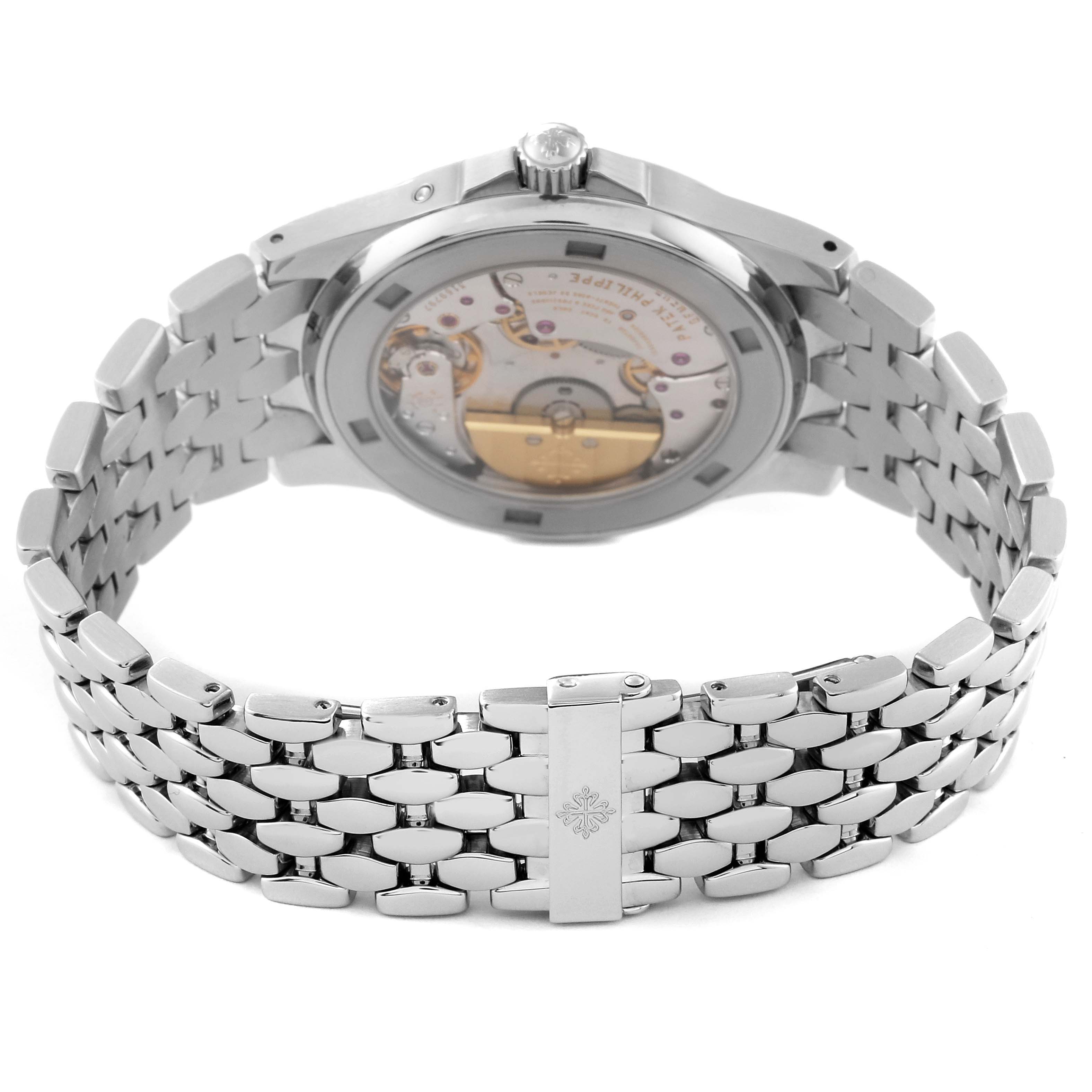 The image shows the back side of the Patek Philippe Neptune 5085/1A-001 Men
s Stainless Steel Black Dial 5085/1A-001 Men
s Stainless Steel Black Dial watch, highlighting the automatic movement and stainless steel bracelet.