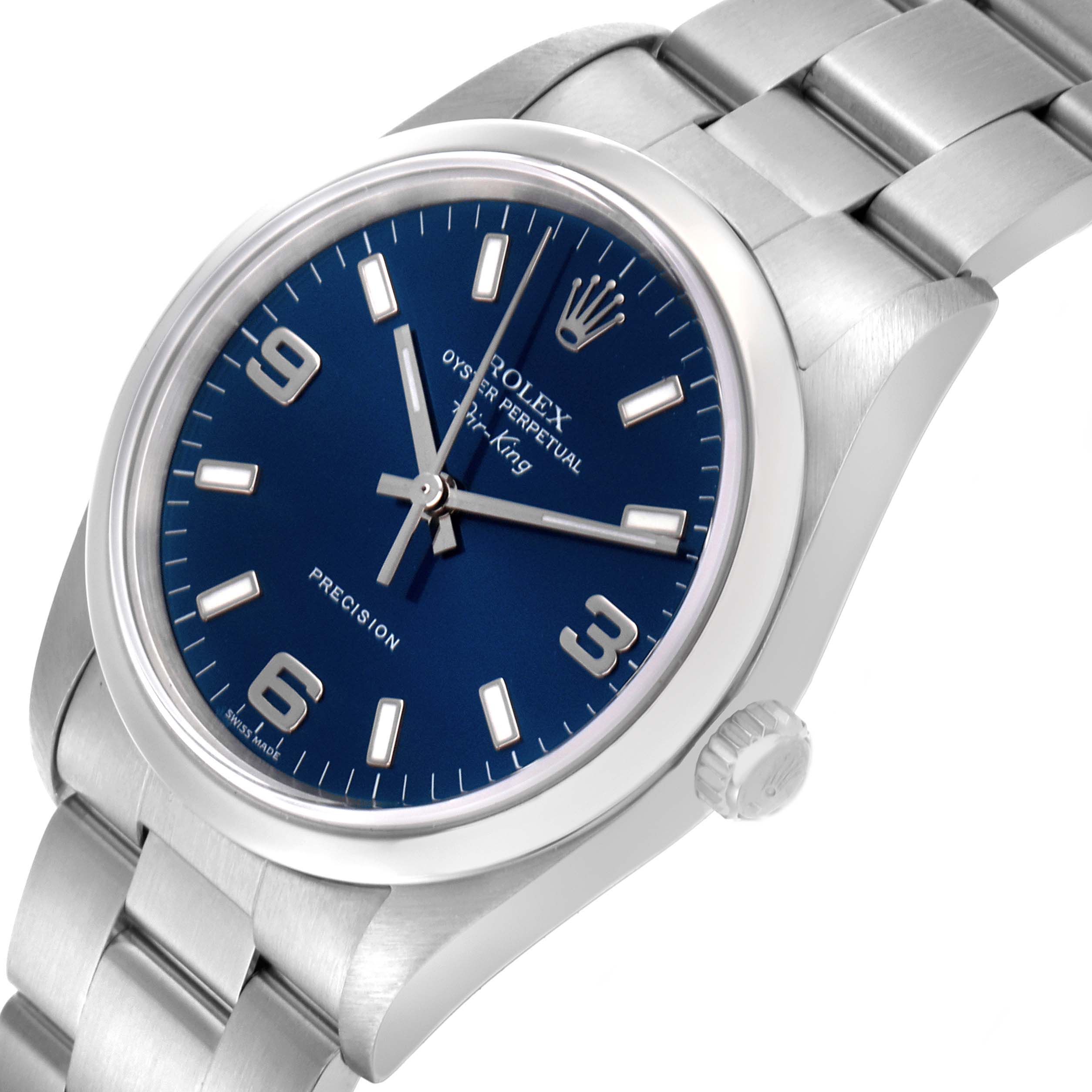The Rolex Air-King 14000M Men's Stainless Steel Blue Dial 14000M Men's Stainless Steel Blue Dial watch is shown at a slight angle, highlighting its blue dial, hour markers, crown, and stainless steel bracelet.