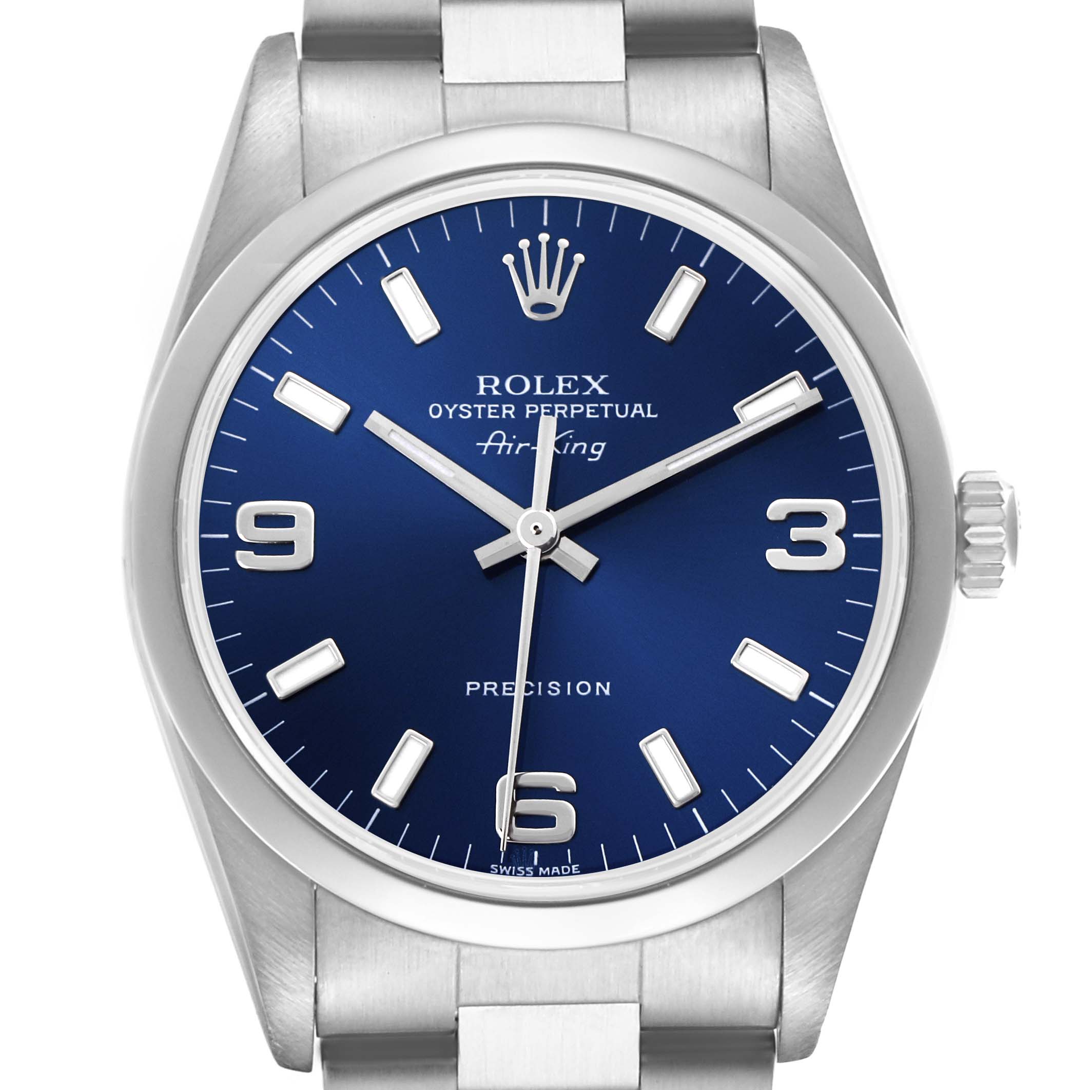 The Rolex Air-King 14000M Men's Stainless Steel Blue Dial 14000M Men's Stainless Steel Blue Dial watch is shown from the front, highlighting the blue dial, hour markers, hands, crown, and part of the bracelet.