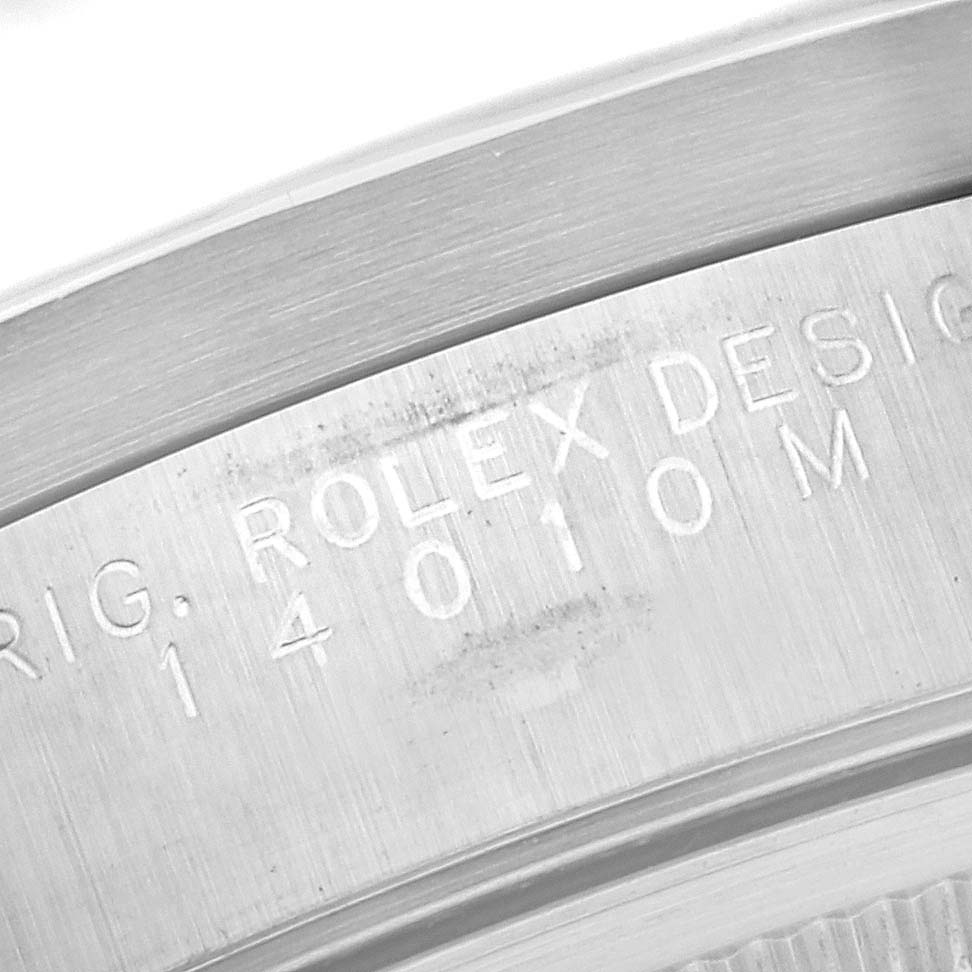 This image shows an angled close-up of the model number and "Rolex" inscription on the case of a Rolex Air-King 14010 Men's Stainless Steel Black Dial 14010 Men's Stainless Steel Black Dial watch.