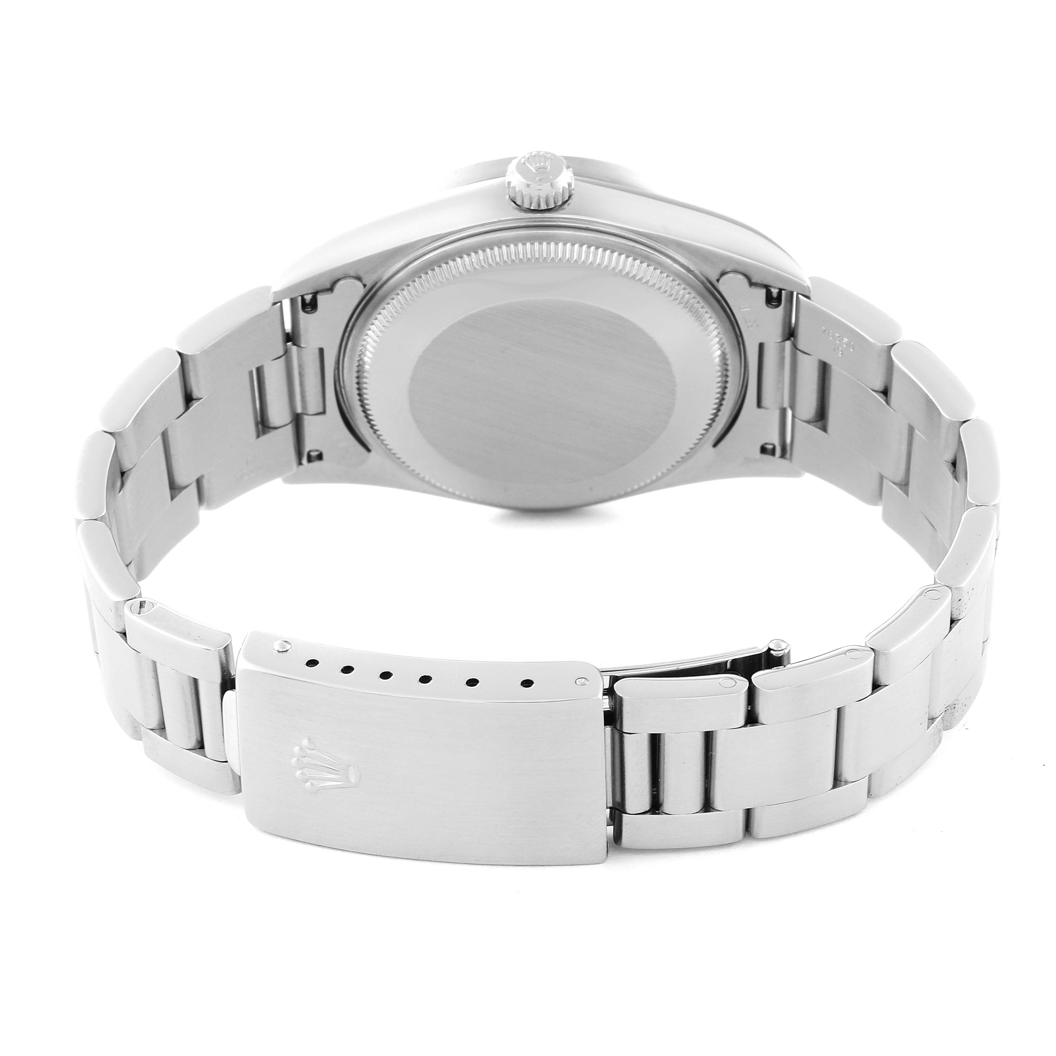 This image shows the back view of a Rolex Air-King 14010 Men's Stainless Steel Silver Dial 14010 Men's Stainless Steel Silver Dial watch, highlighting its case back, clasp, and bracelet.