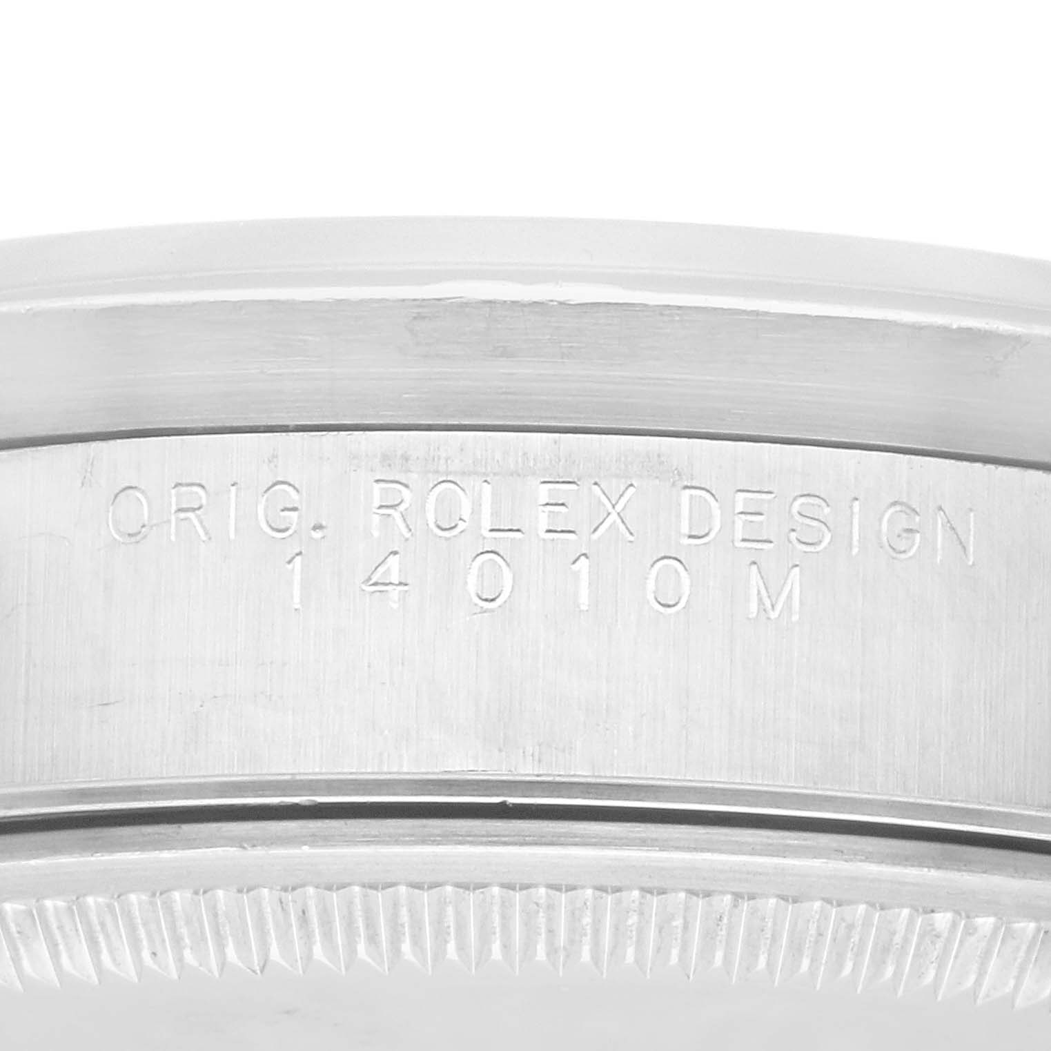 This image shows a close-up of the side of a Rolex Air-King 14010 Men's Stainless Steel Silver Dial 14010 Men's Stainless Steel Silver Dial watch, highlighting the engraved model number and design details.