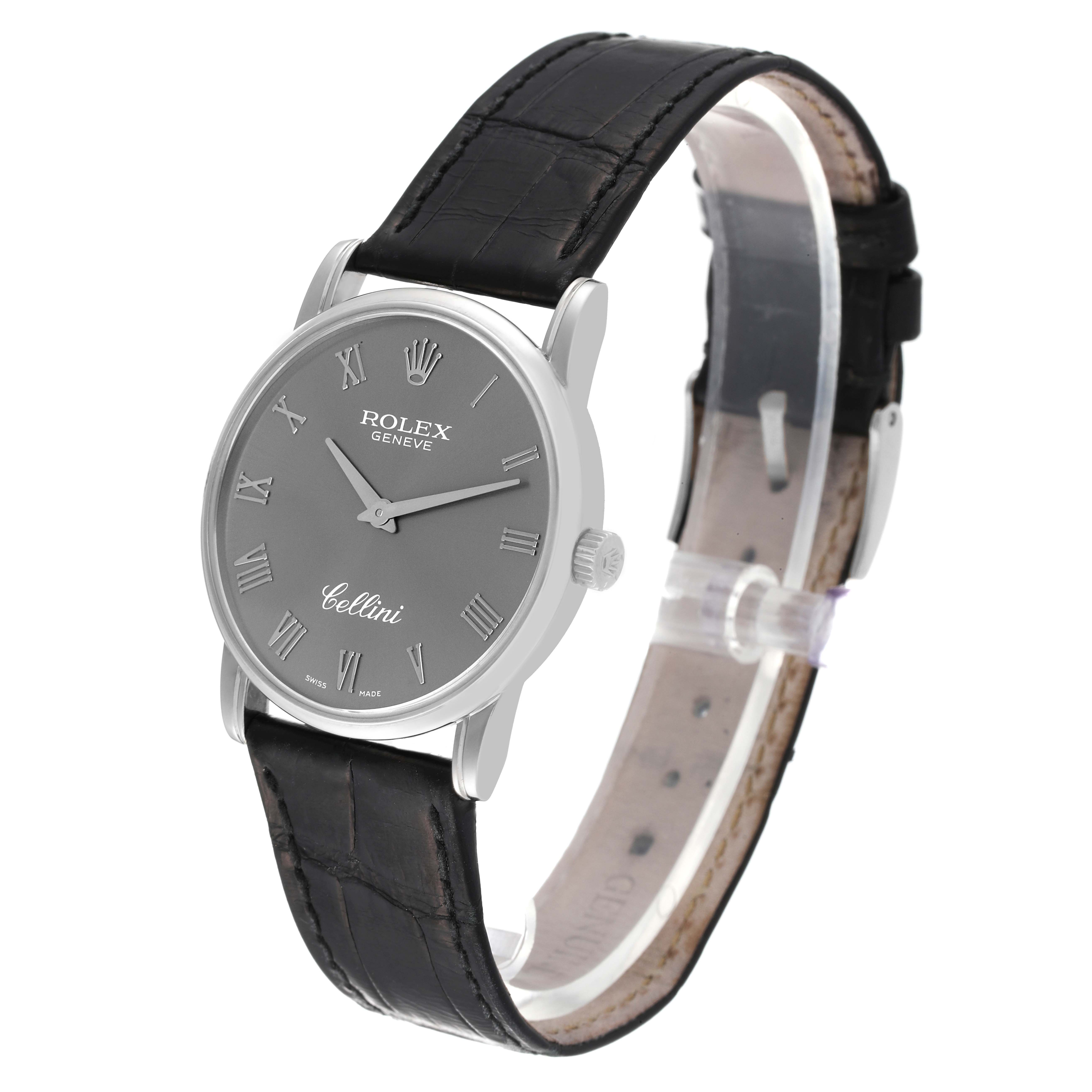 The image shows a Rolex Cellini 5116 Men
s Stainless Steel Grey Dial 5116 Men
s Stainless Steel Grey Dial watch at a 3/4 angle, highlighting the dial, case, and leather strap.