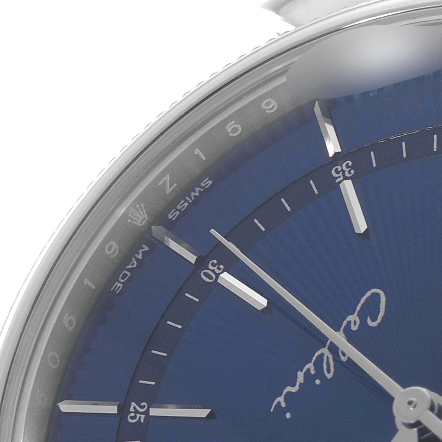 This close-up angle of a Rolex Cellini 50519 Men's White Gold Blue Dial 50519 Men's White Gold Blue Dial watch shows the dial, part of the bezel, and the minute and hour hands.