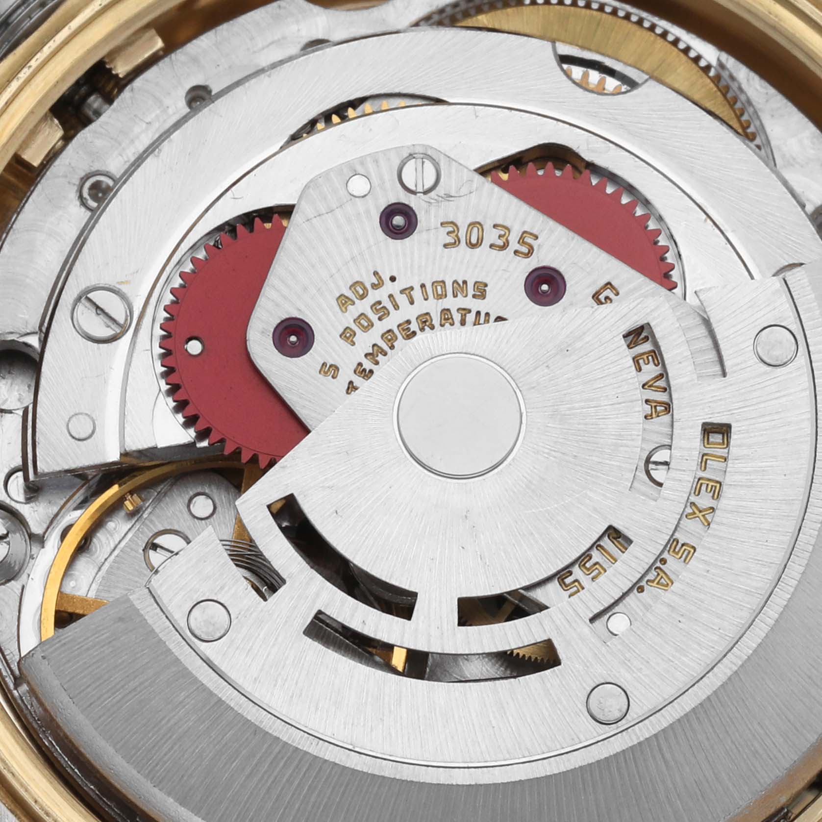 The image shows a close-up of the movement of a Rolex Date 15037 Men's Yellow Gold Champagne Dial 15037 Men's Yellow Gold Champagne Dial model, featuring gears and rotor.