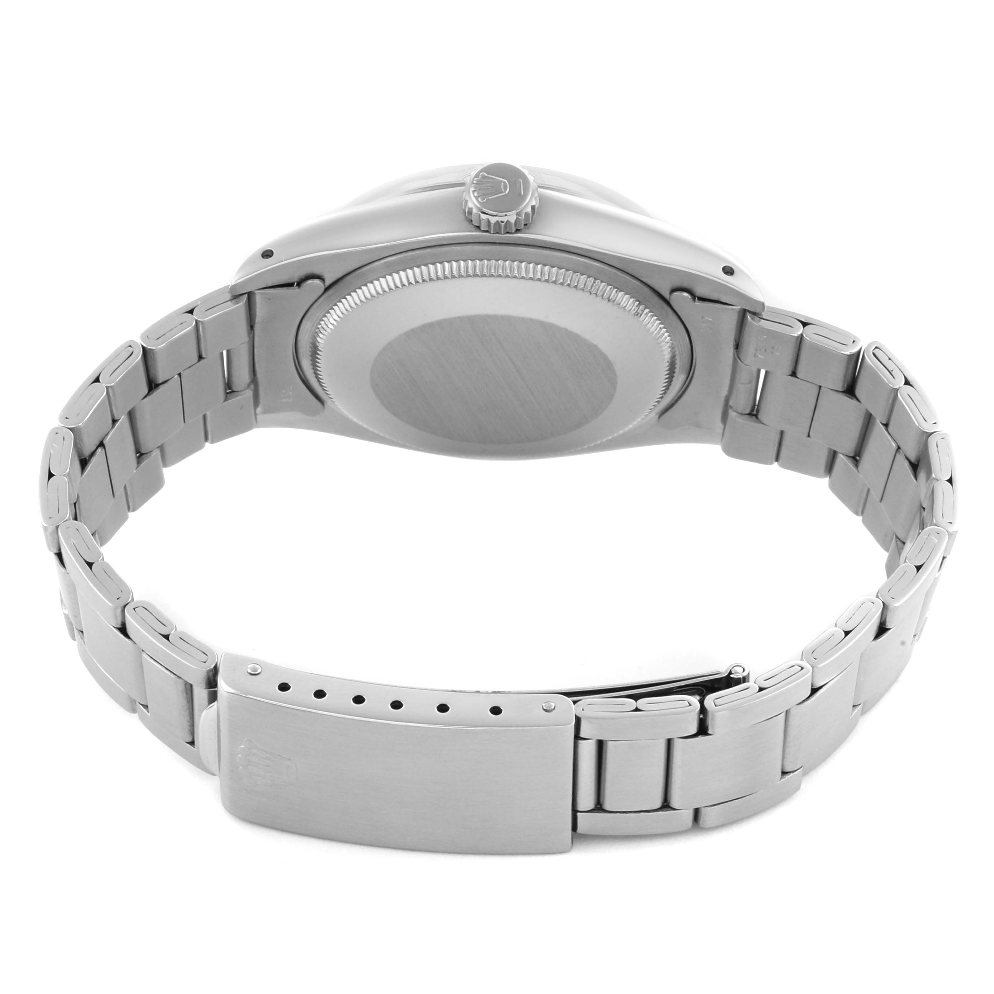 The Rolex Date 68587 Men's Stainless Steel Silver Dial 68587 Men's Stainless Steel Silver Dial model is shown from the back, displaying the bracelet, clasp, case back, and crown.