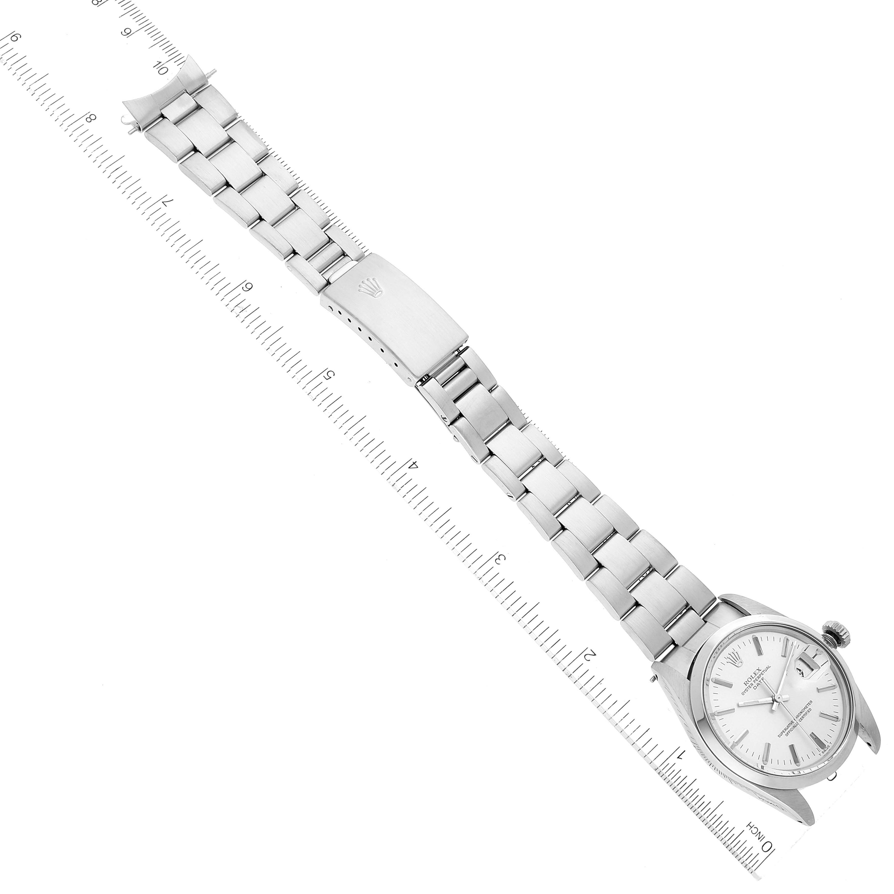 The image shows a top-down view of the Rolex Vintage Collection 1500 Men
s Stainless Steel Silver Dial 1500 Men
s Stainless Steel Silver Dial watch, displaying the face, bracelet, and clasp.