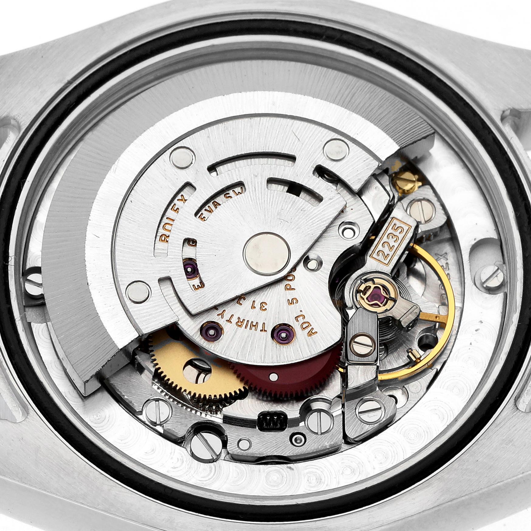 The image shows the internal mechanism of a Rolex Mid-Size 178274 Women's Stainless Steel Mother of Pearl Dial 178274 Women's Stainless Steel Mother of Pearl Dial watch from the back, displaying its intricate movement components.