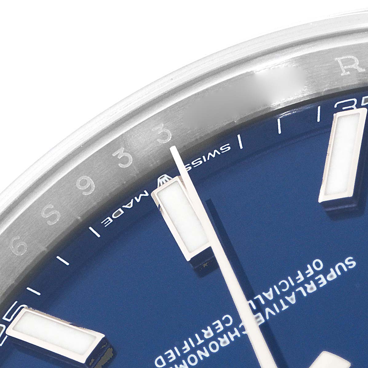 This image shows a close-up of the dial and bezel of a Rolex Datejust 41 126300 Men
s Stainless Steel Blue Dial 126300 Men
s Stainless Steel Blue Dial, focusing on the blue face and hour markers.