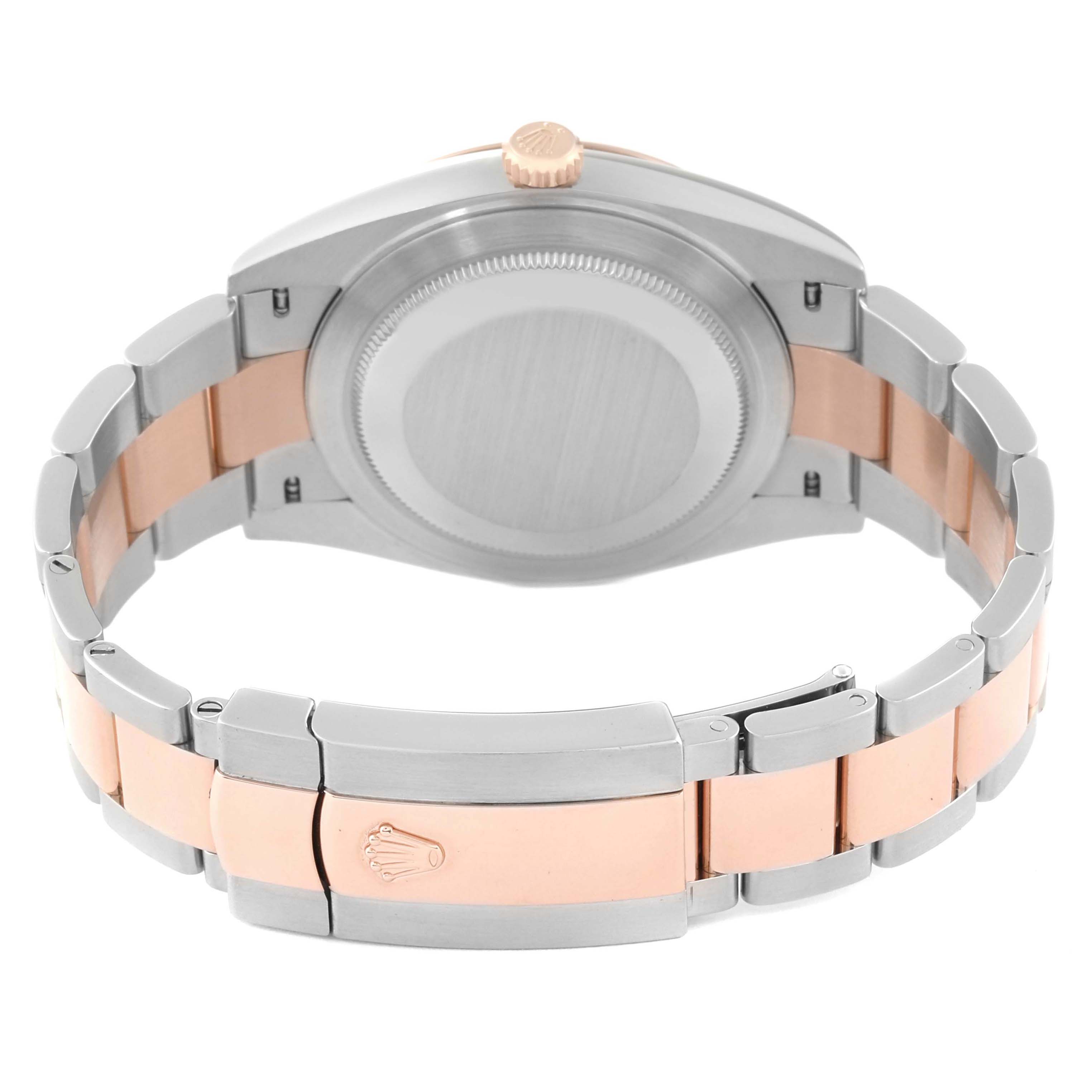 The image shows a rear view of a Rolex Datejust 41 126331 Men's Steel and Gold (two tone) Mother of Pearl Dial, highlighting the bracelet, clasp, case back, and crown.