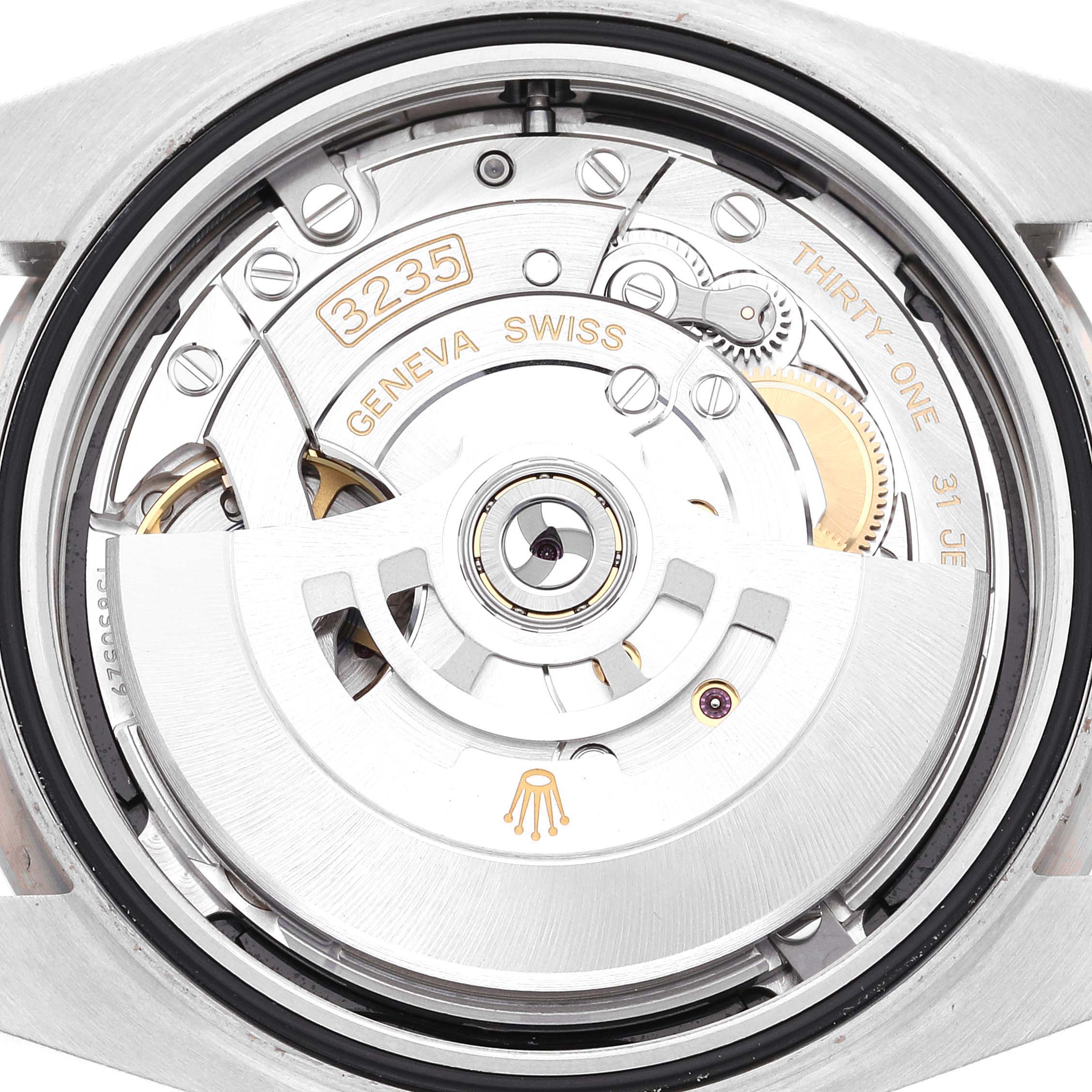 This image shows the internal mechanism of the Rolex Datejust 41 126334 Men's Stainless Steel Black Dial 126334 Men's Stainless Steel Black Dial, specifically the movement caliber 3235 with visible gears and components.