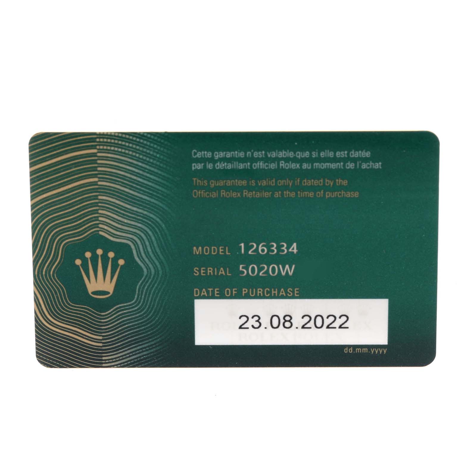 This image shows a green Rolex warranty card for the Datejust 41 model with the serial number and date of purchase printed.