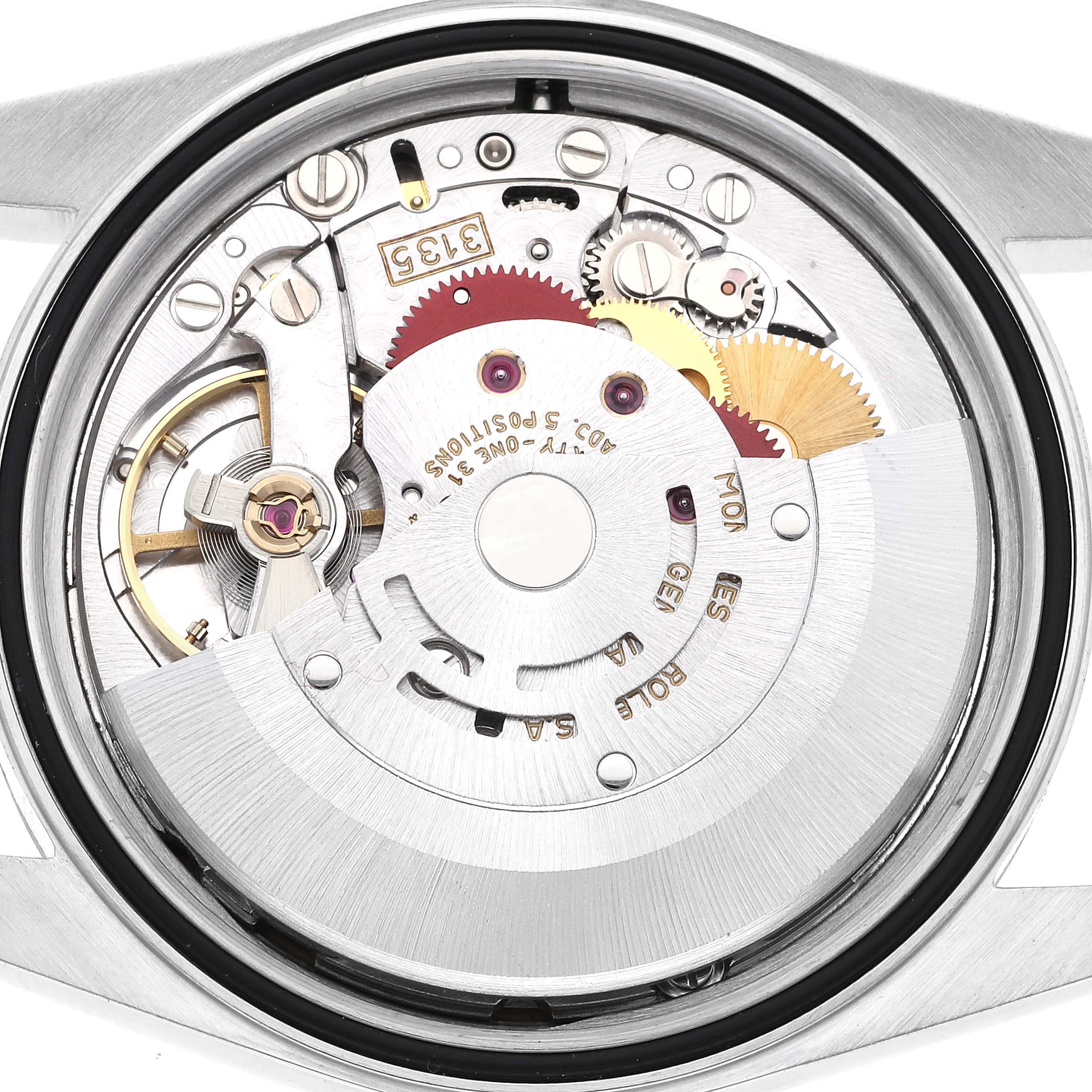 The image shows the internal mechanism of a Rolex Datejust 16233 Men's Steel and Gold (two tone) Champagne Dial 16233 Men's Steel and Gold (two tone) Champagne Dial, viewed from the back, showcasing its intricate gears and components.