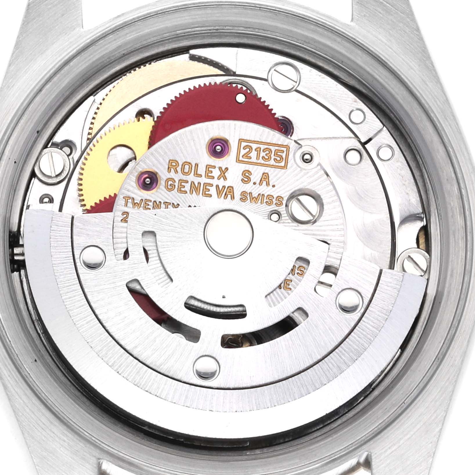 The image shows a close-up view of the movement inside a Rolex Datejust 69173 Women's Steel and Gold (two tone) Champagne Dial 69173 Women's Steel and Gold (two tone) Champagne Dial watch, highlighting gears and the rotor.