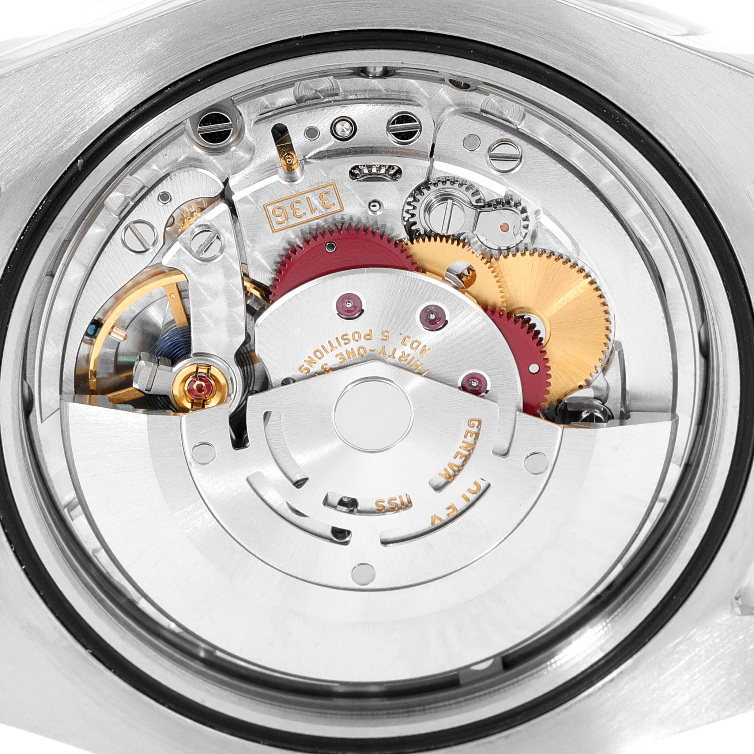 This image shows the mechanical movement and inner components of the Rolex Datejust 41 116333 Men's Steel and Gold (two tone) Grey Dial 116333 Men's Steel and Gold (two tone) Grey Dial watch from the back.