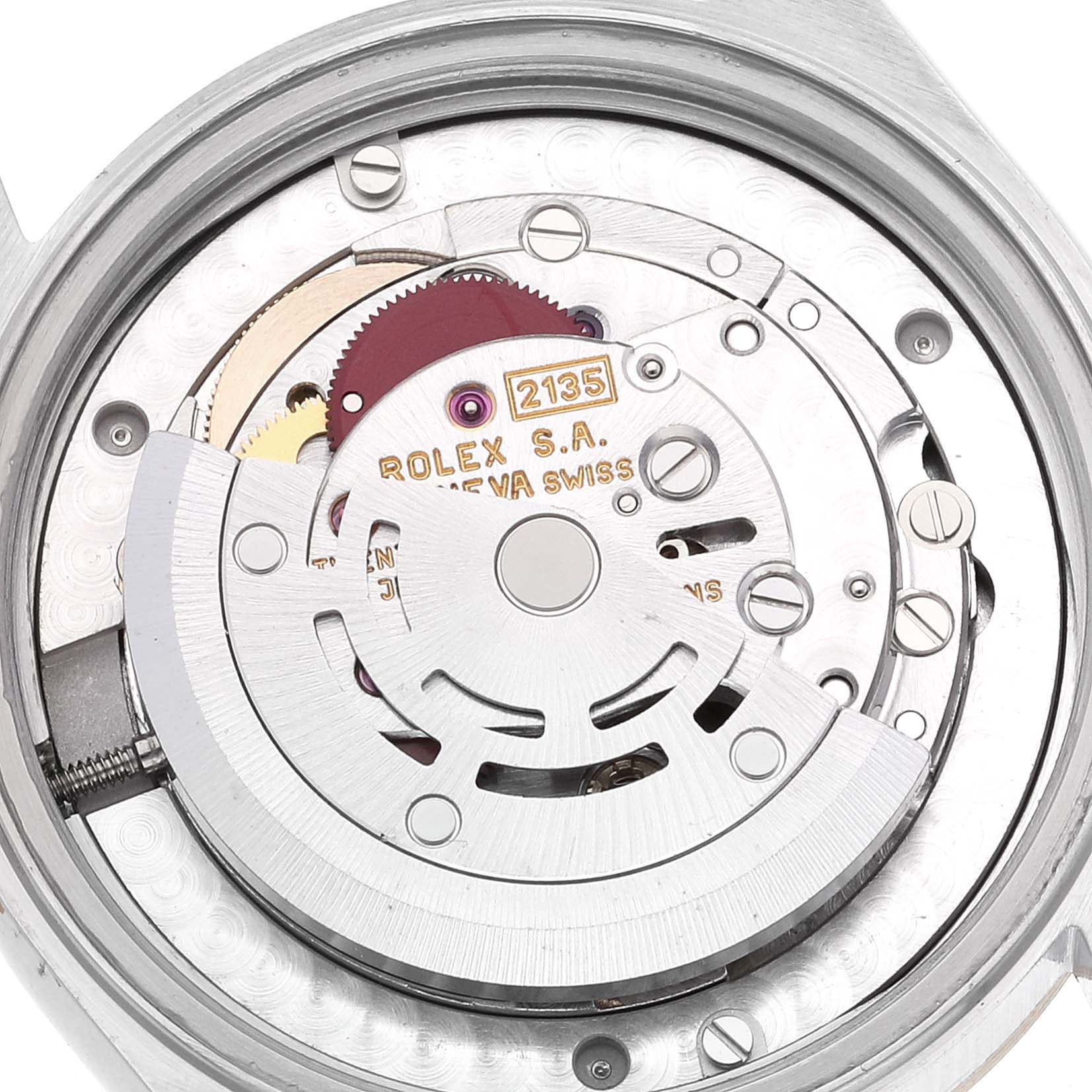 This is a close-up of the movement inside a Mid-Size Rolex watch, specifically model 2135. 