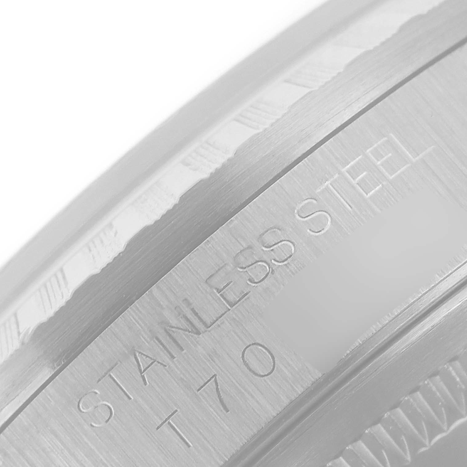 This image shows a close-up of the stainless steel casing of the Rolex Datejust 16220 Men's Stainless Steel Silver Dial 16220 Men's Stainless Steel Silver Dial watch.
