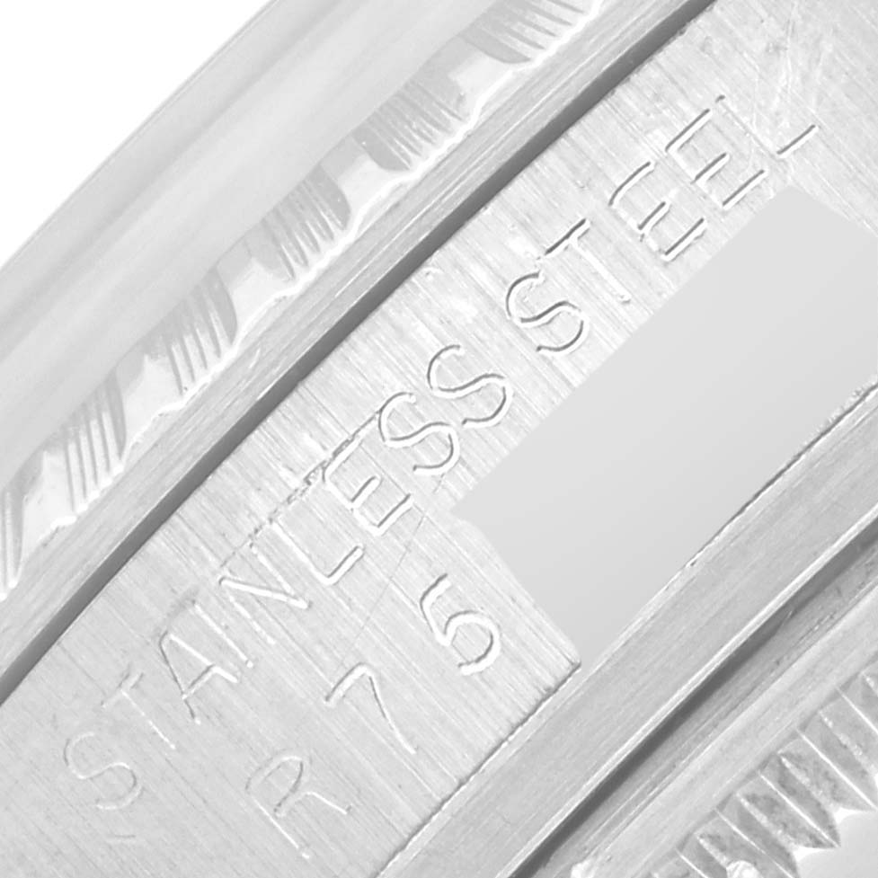 The image shows a close-up of the case and serial number engraving on the Rolex Vintage Collection 16030 Men's Stainless Steel Silver Dial 16030 Men's Stainless Steel Silver Dial model watch.