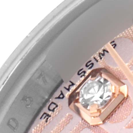 This image shows a close-up of the dial on a Rolex Datejust 179171 Women's Steel and Gold (two tone) Pink Dial 179171 Women's Steel and Gold (two tone) Pink Dial, highlighting the diamond hour marker and "SWISS MADE" text.