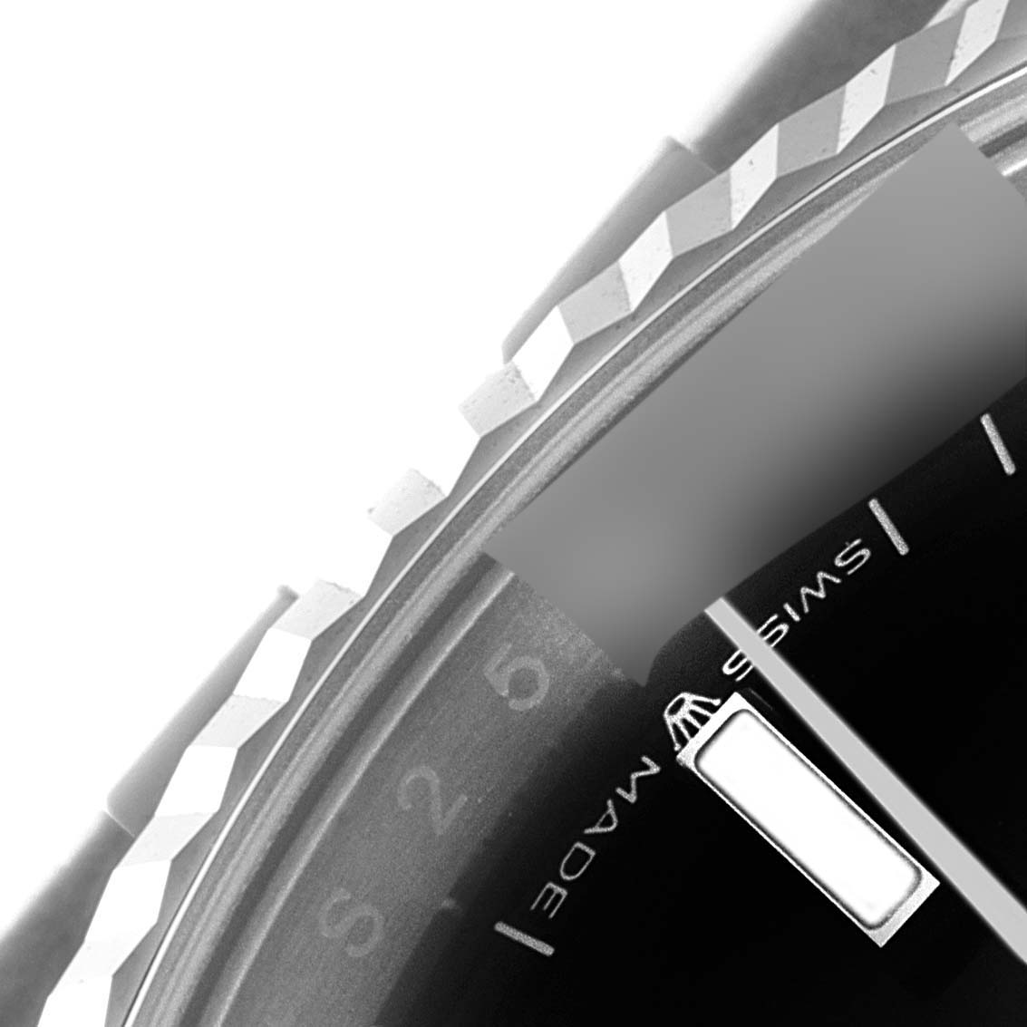 The image shows a close-up of the bezel and a portion of the dial of a Rolex Datejust 126234 Men
s Stainless Steel Black Dial 126234 Men
s Stainless Steel Black Dial watch.