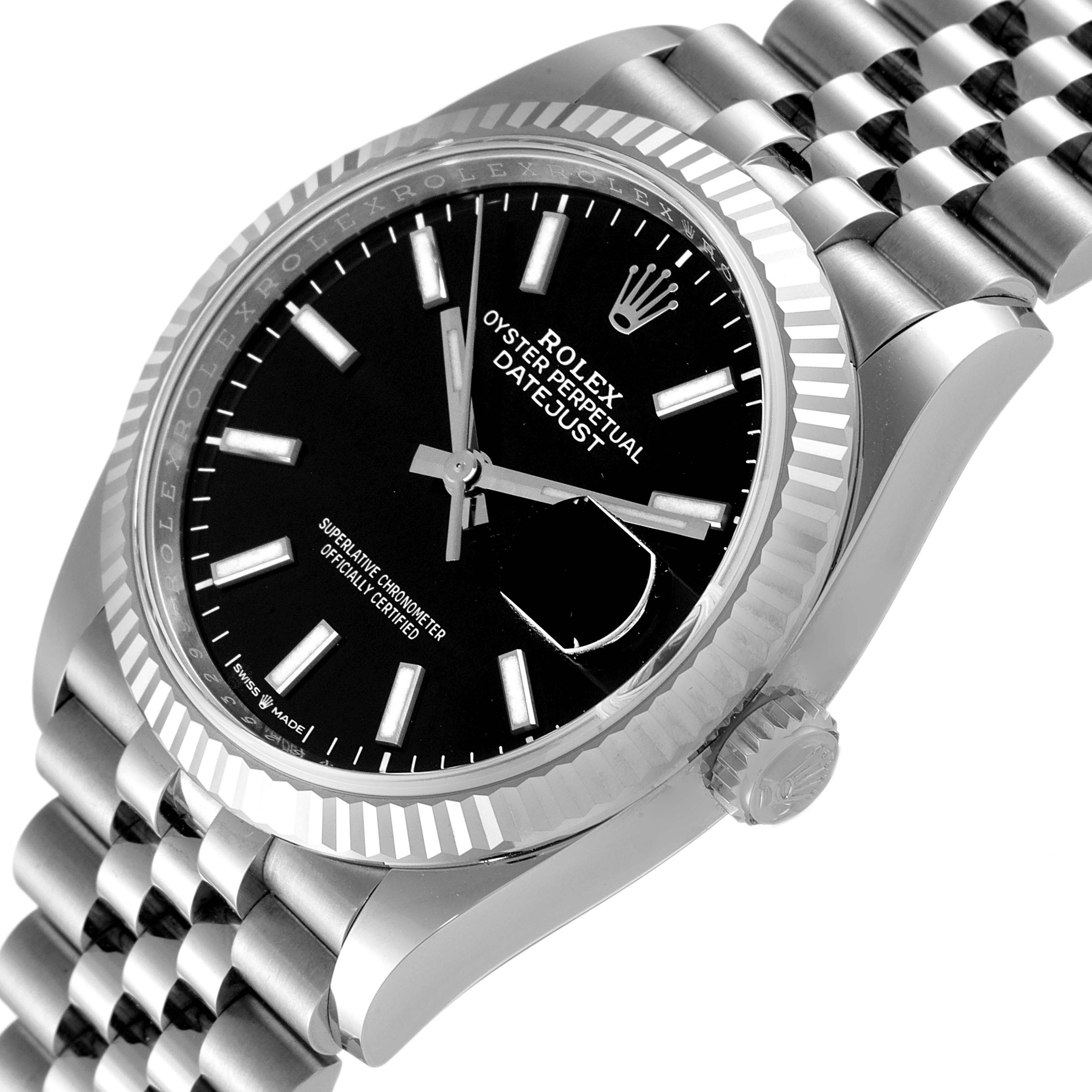 This image shows a close-up angled view of the face, bezel, and part of the bracelet of a Rolex Datejust 126234 Men
s Stainless Steel Black Dial 126234 Men
s Stainless Steel Black Dial watch.