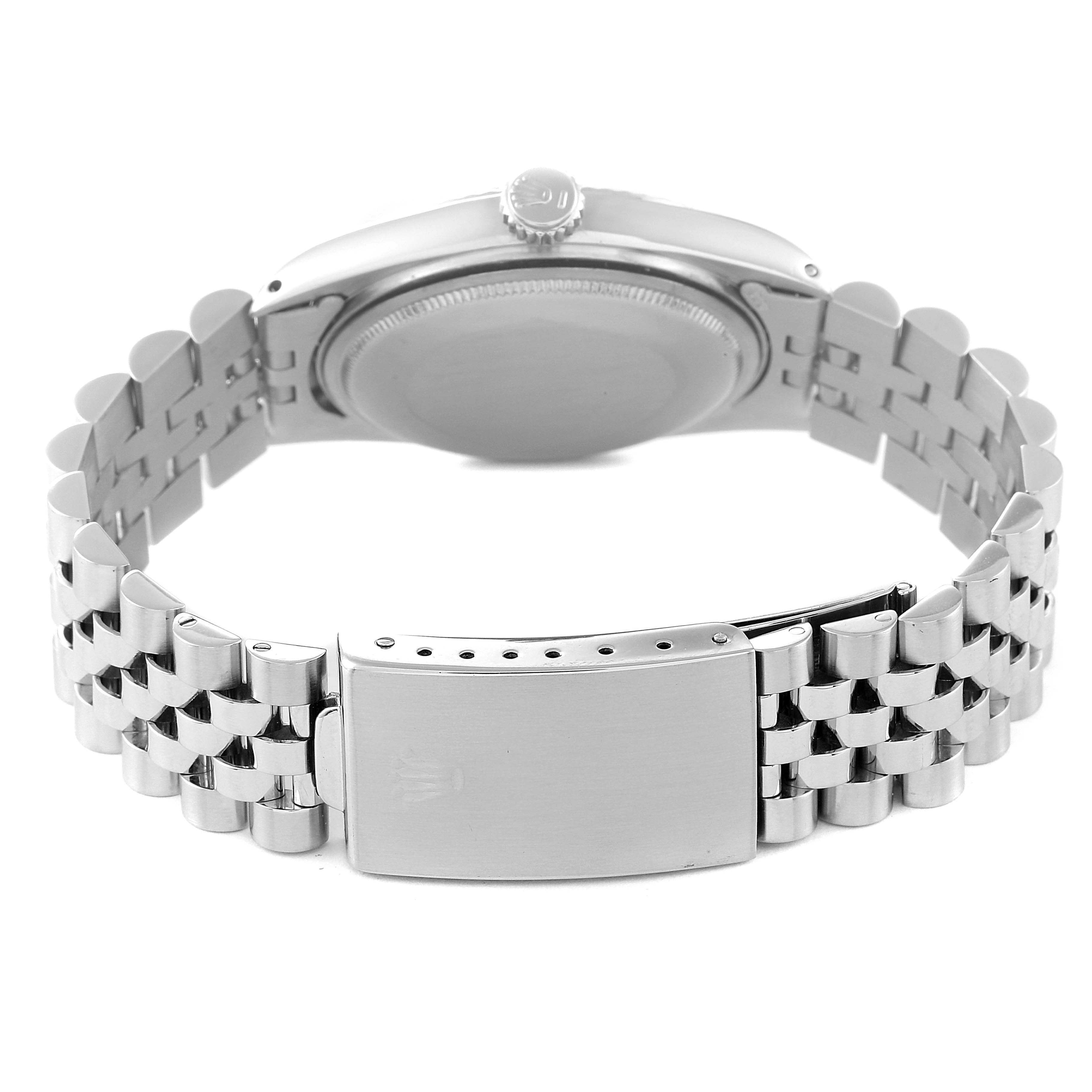 This image shows the back view, clasp, and bracelet of a Rolex Vintage Collection 1601 Men
s Stainless Steel Black Dial 1601 Men
s Stainless Steel Black Dial model watch.