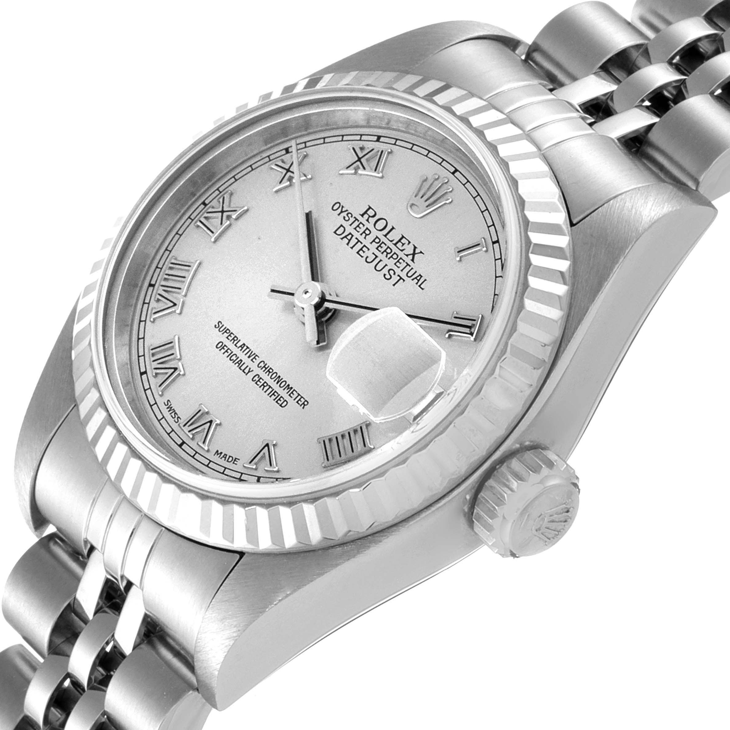 The image shows a close-up, angled view of a Rolex Datejust 79174 Women
s Stainless Steel Silver Dial 79174 Women
s Stainless Steel Silver Dial watch, highlighting the dial, crown, and part of the bracelet.