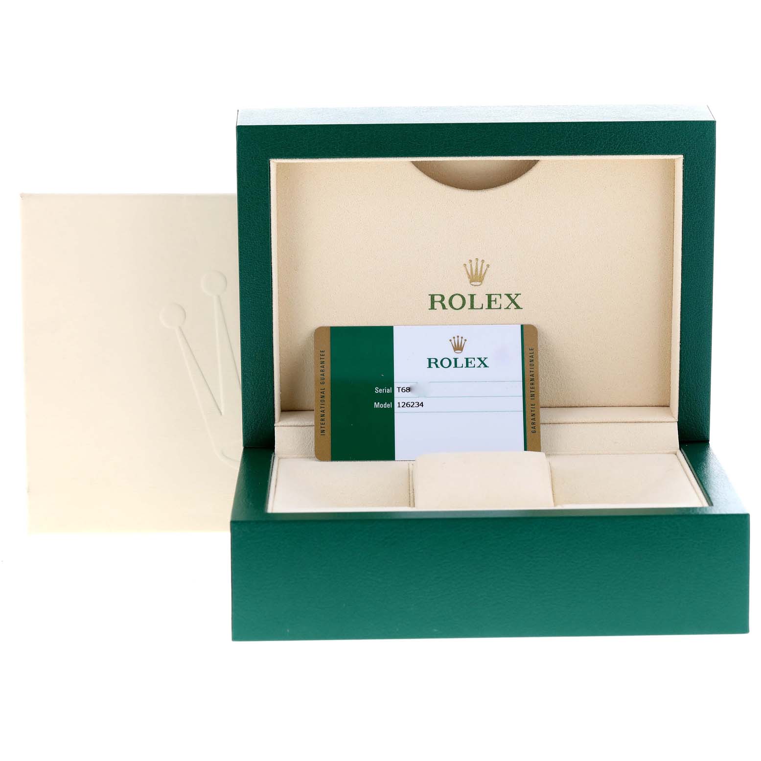 The image shows a green Rolex box with an open lid, revealing the certification card for a Datejust model by Rolex.