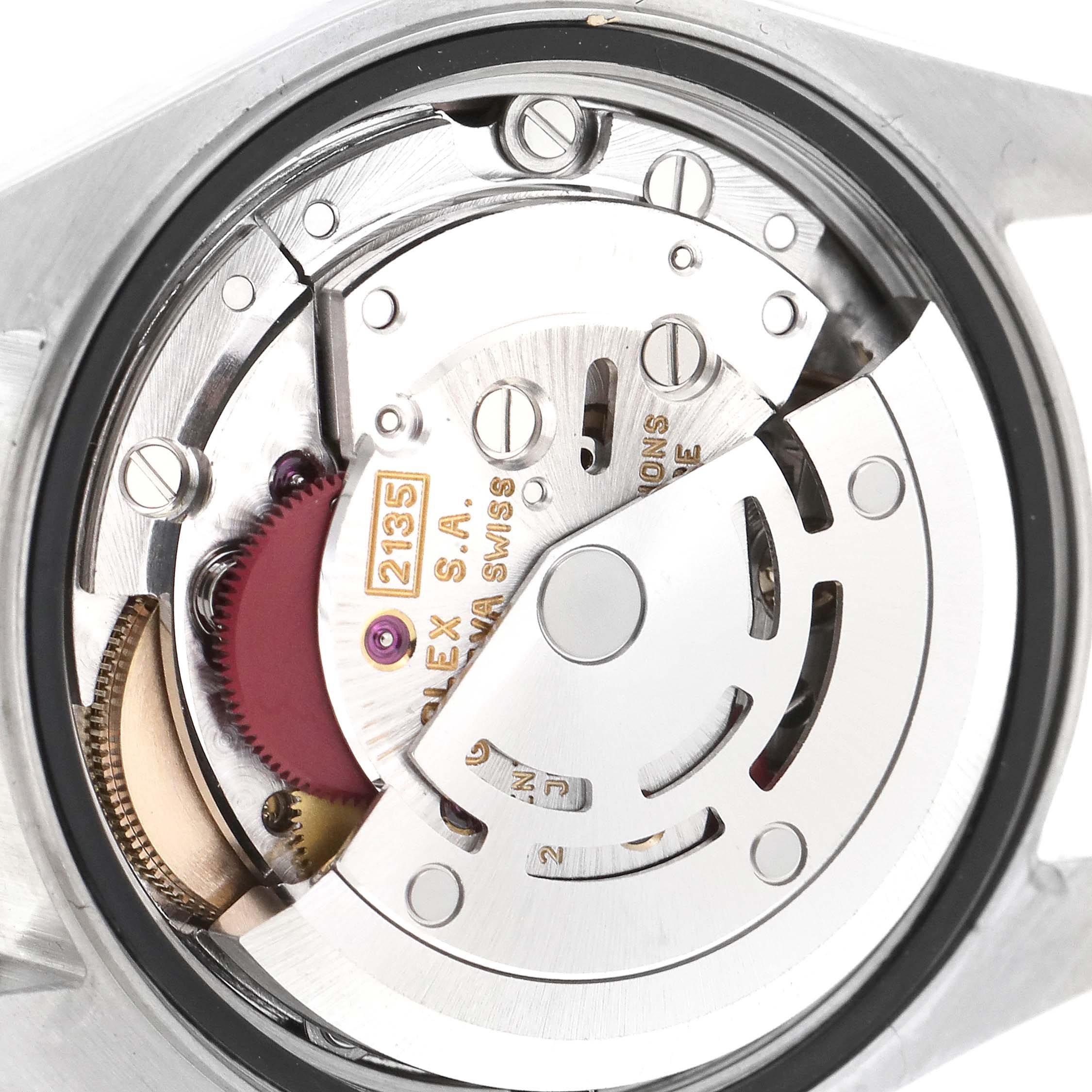 This image shows a close-up of the movement inside a Rolex Datejust 69173 Women's Steel and Gold (two tone) Mother of Pearl Dial 69173 Women's Steel and Gold (two tone) Mother of Pearl Dial watch, specifically focusing on the intricate mechanical parts.