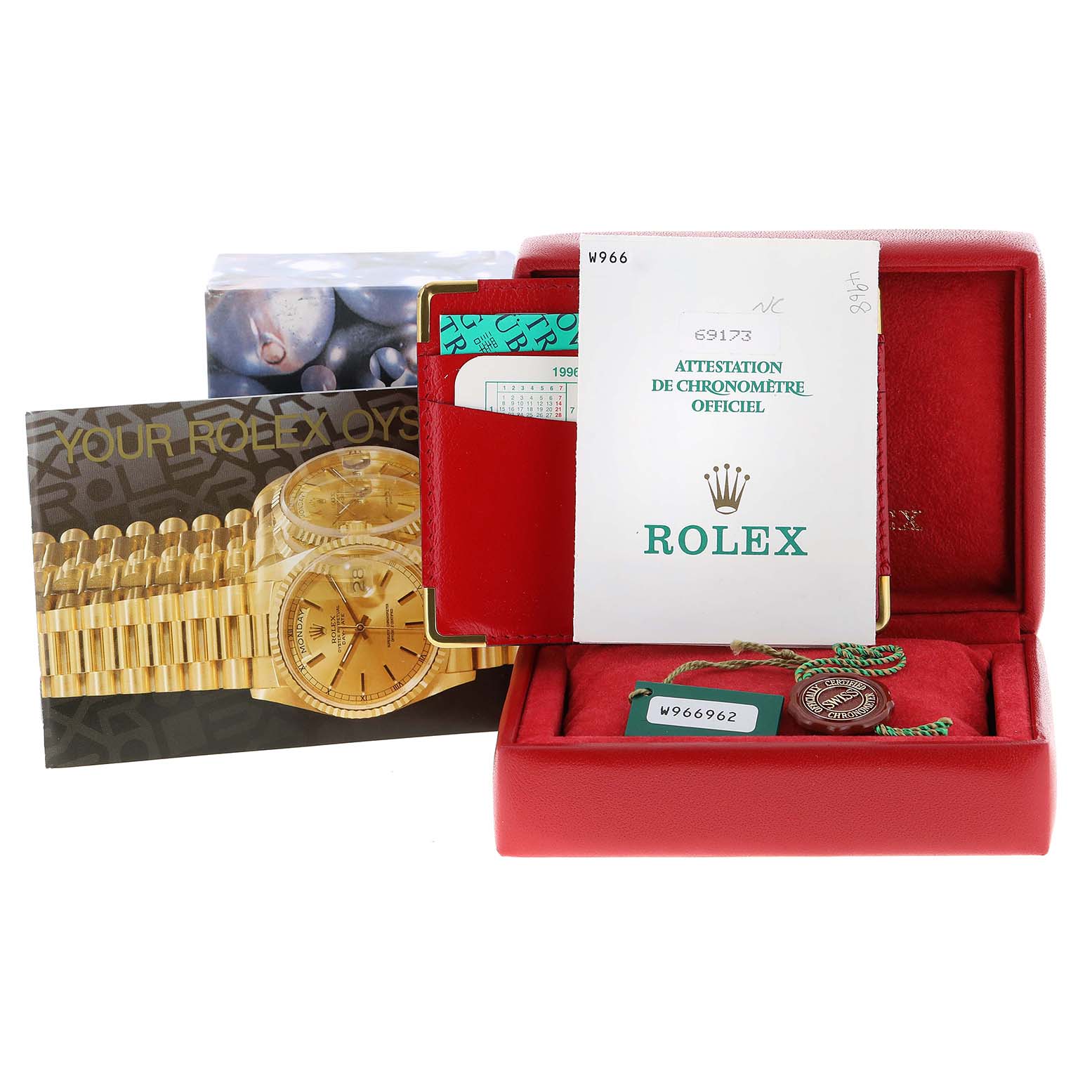 The image shows the Rolex Datejust 69173 Women's Steel and Gold (two tone) Mother of Pearl Dial 69173 Women's Steel and Gold (two tone) Mother of Pearl Dial watch box, certification documents, and tags at an angle, with the watch itself not visible.