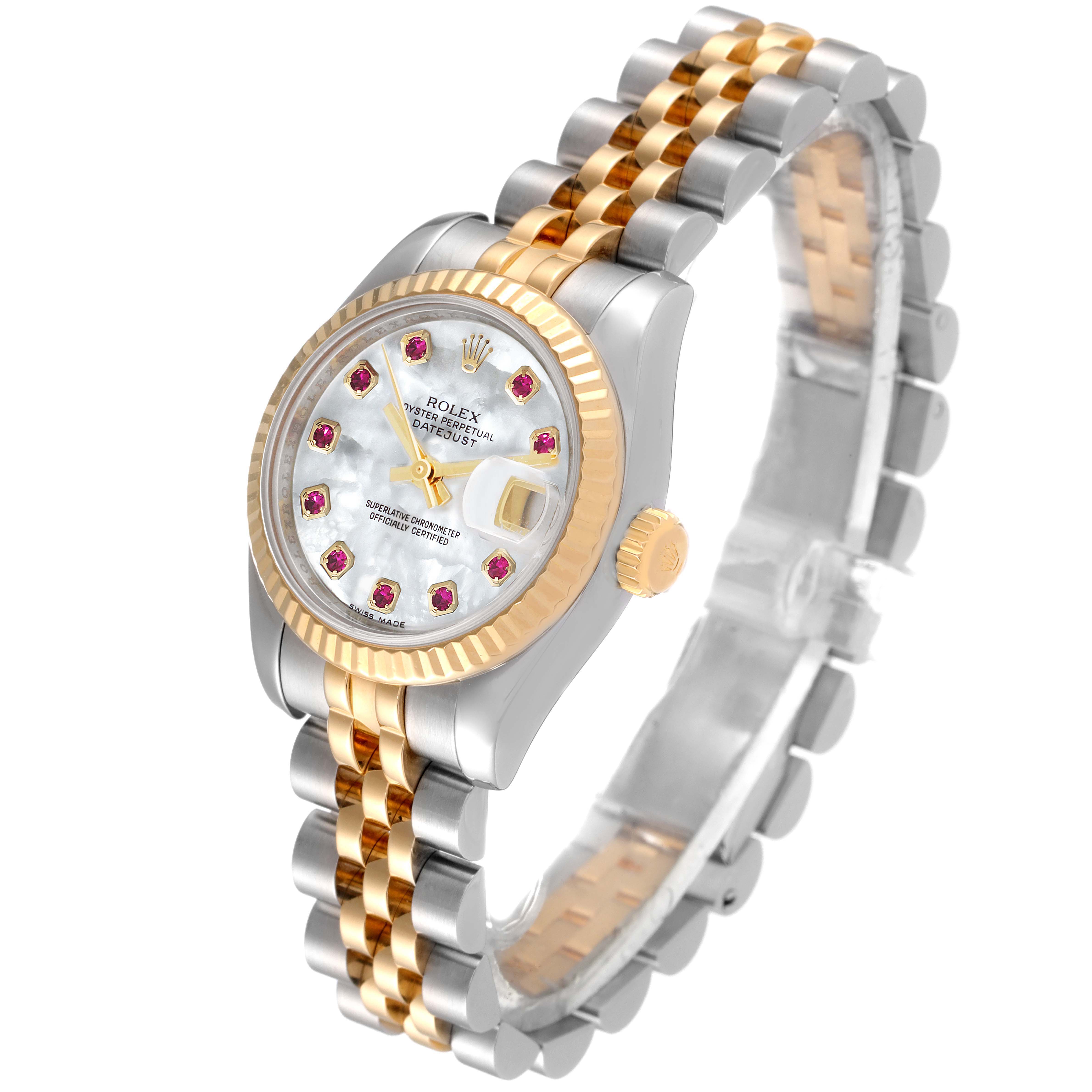 The image shows a Rolex Datejust 179173 Women's Steel and Gold (two tone) Mother of Pearl Dial 179173 Women's Steel and Gold (two tone) Mother of Pearl Dial watch at an angled side view, displaying the dial, bezel, crown, and bracelet.