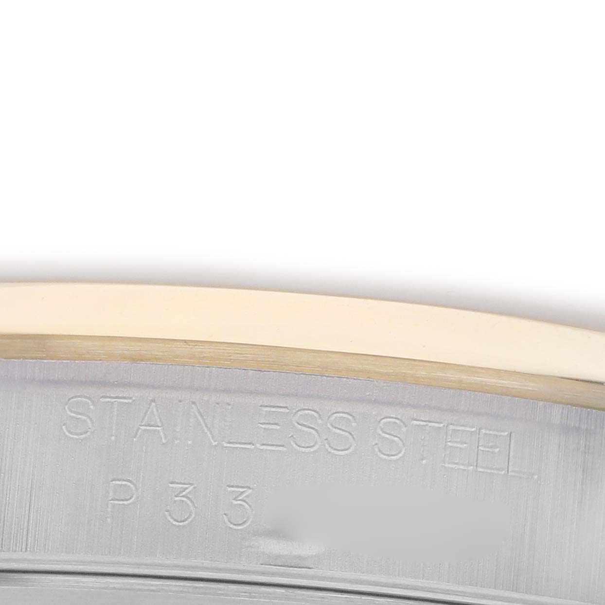 The image shows a close-up of the case edge, displaying "STAINLESS STEEL" engraving on the Rolex Datejust 16203 Men's Steel and Gold (two tone) Grey Dial 16203 Men's Steel and Gold (two tone) Grey Dial.