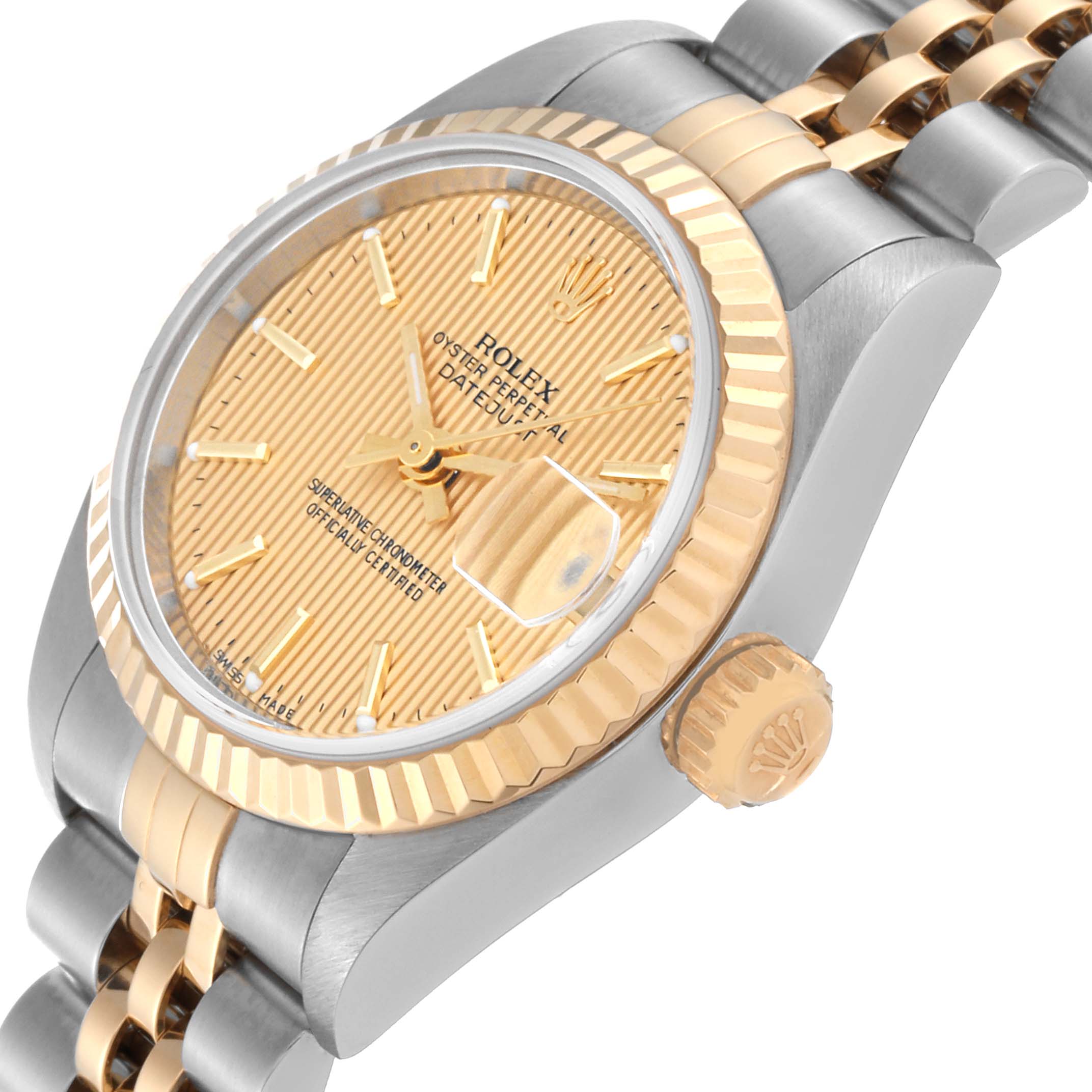 The image shows a close-up view of the Rolex Datejust 79173 Women's Steel and Gold (two tone) Champagne Dial 79173 Women's Steel and Gold (two tone) Champagne Dial watch, highlighting the dial, fluted bezel, and bracelet.