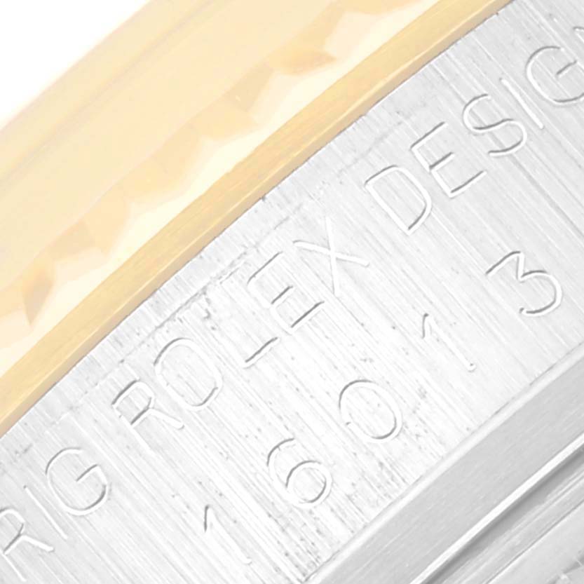 This close-up image shows the edge and engraving of a Vintage Collection model by Rolex.