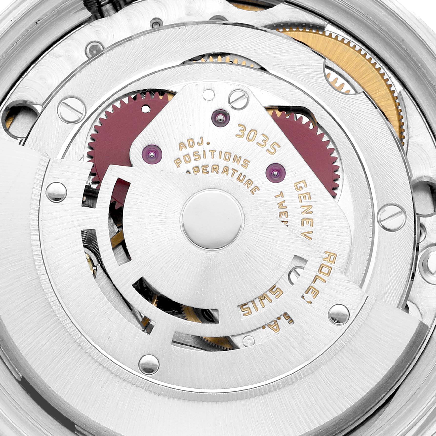 This is a close-up of the movement of the Vintage Collection model by Rolex, showing intricate gears and internal mechanics.