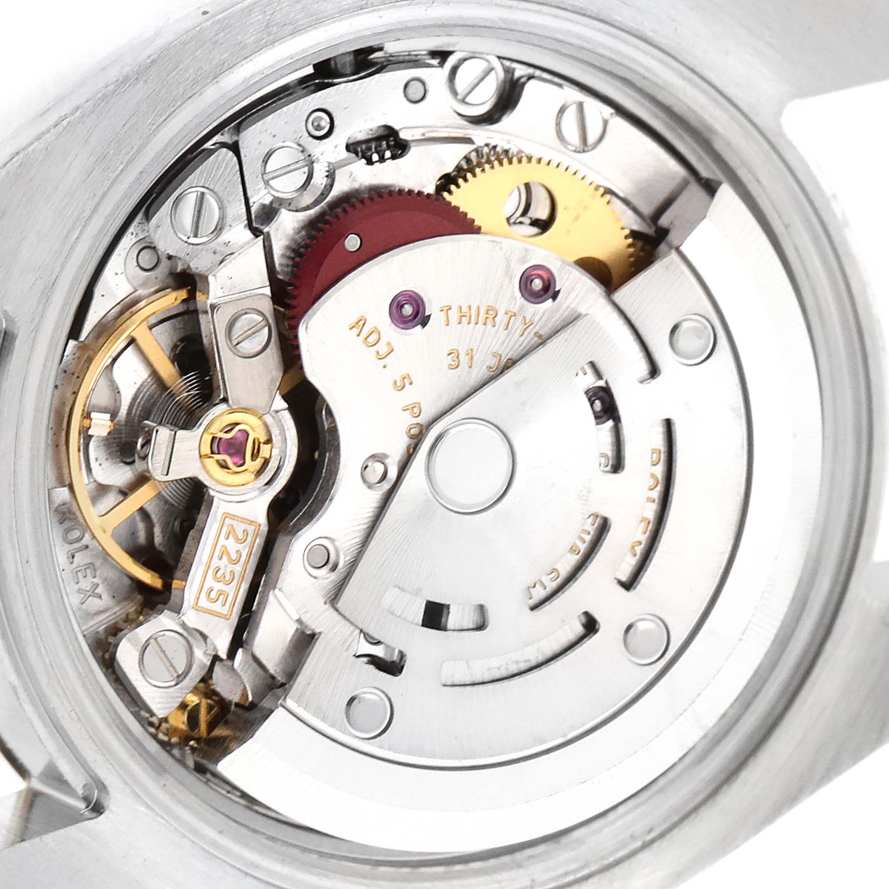 The image shows a close-up view of the movement and mechanism inside a Rolex Datejust 179173 Women's Steel and Gold (two tone) White Dial 179173 Women's Steel and Gold (two tone) White Dial watch.