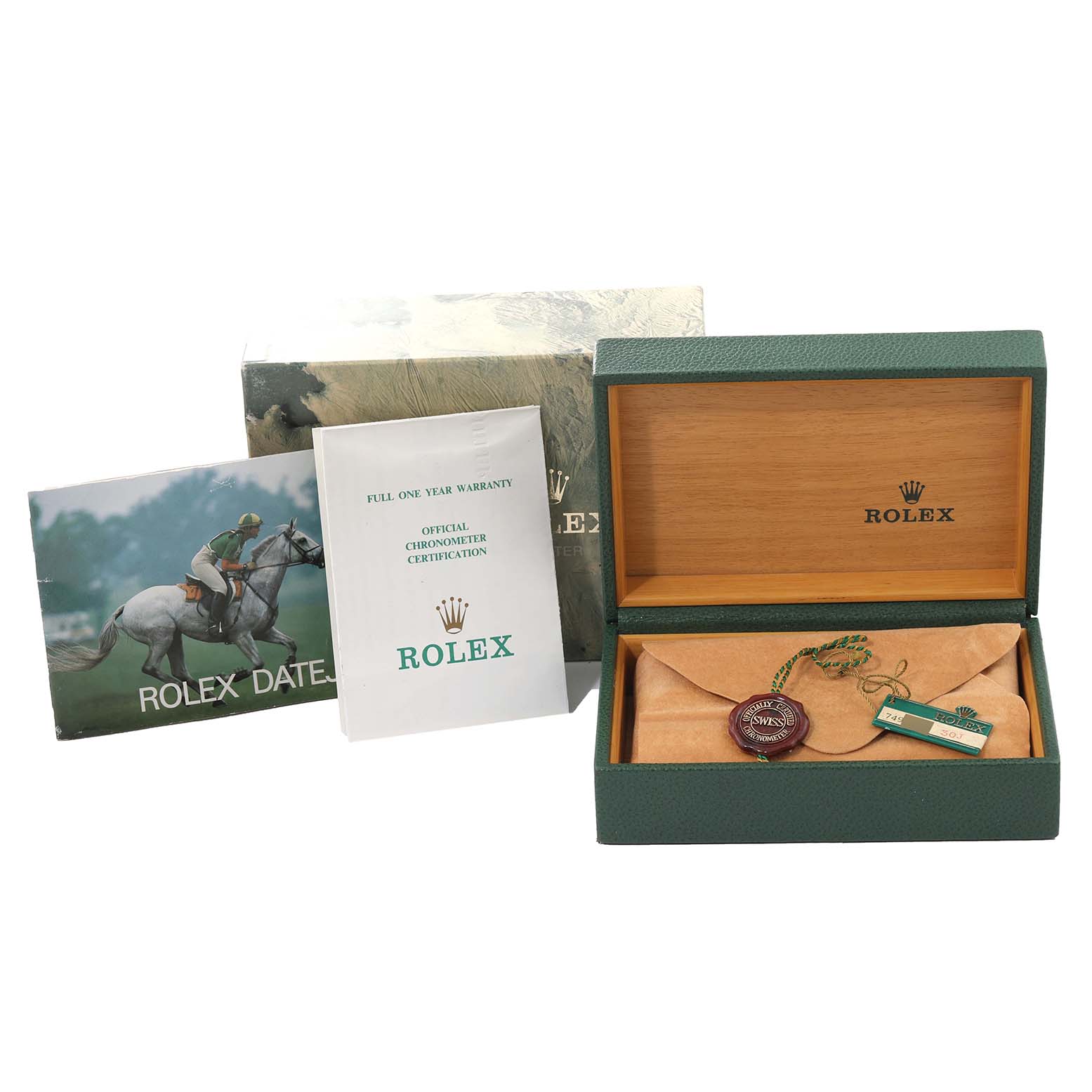 The image shows the box and accessories for a Rolex Vintage Collection 16253 Men's Steel and Gold (two tone) Champagne Dial 16253 Men's Steel and Gold (two tone) Champagne Dial model, including the warranty card and certification papers.