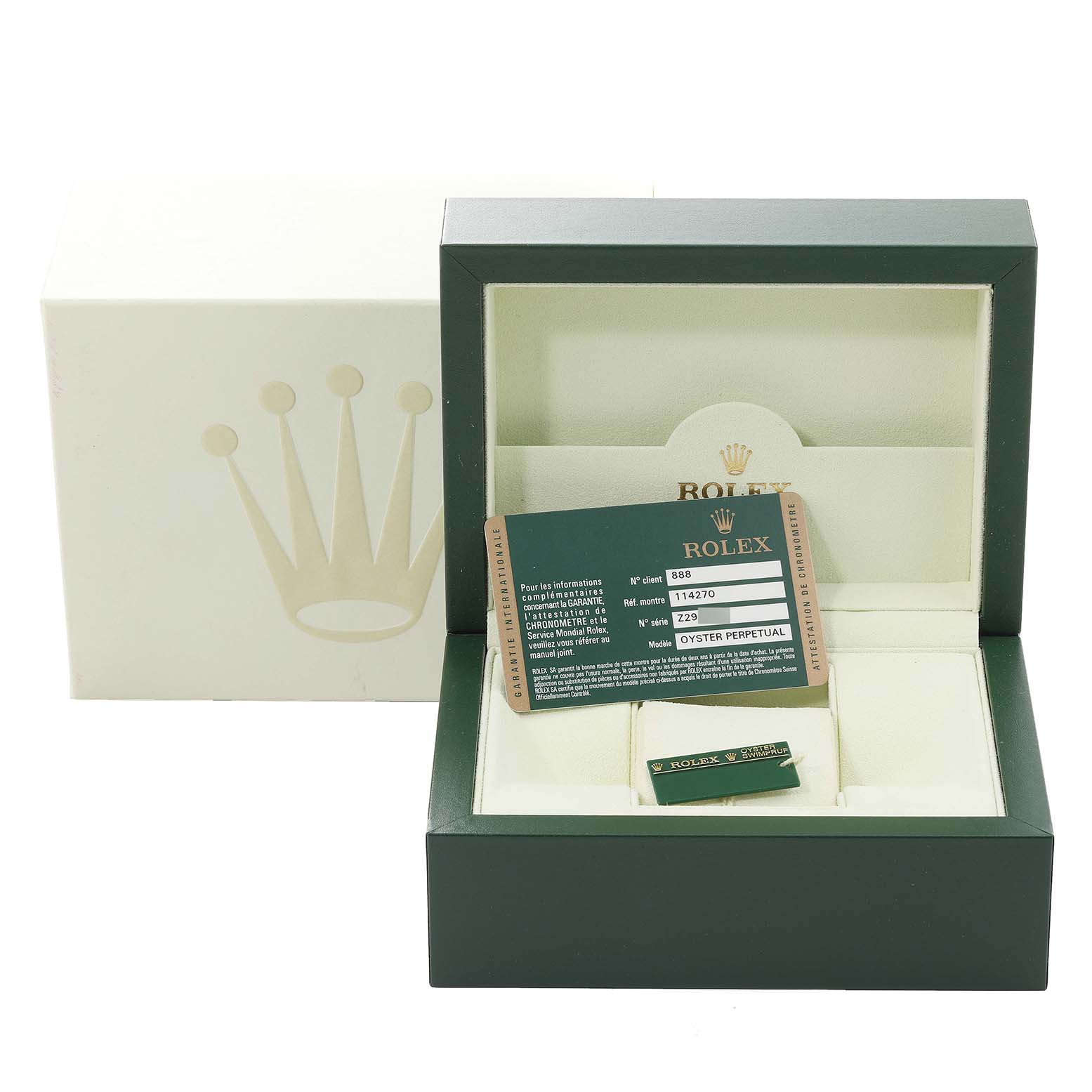 The image shows a Rolex Explorer 114270 Men
s Stainless Steel Black Dial 114270 Men
s Stainless Steel Black Dial box with a warranty card and tag, viewed from the front.