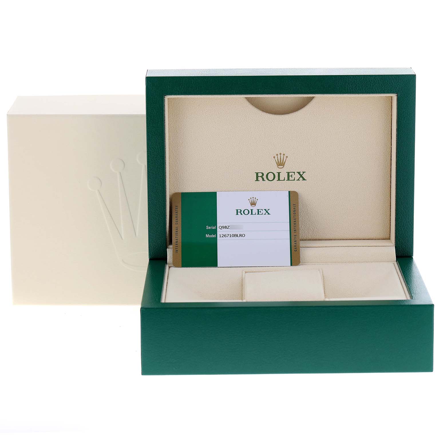 The image shows an open Rolex GMT-Master 126710 Men
s Stainless Steel Black Dial 126710 Men
s Stainless Steel Black Dial watch box with a warranty card inside.