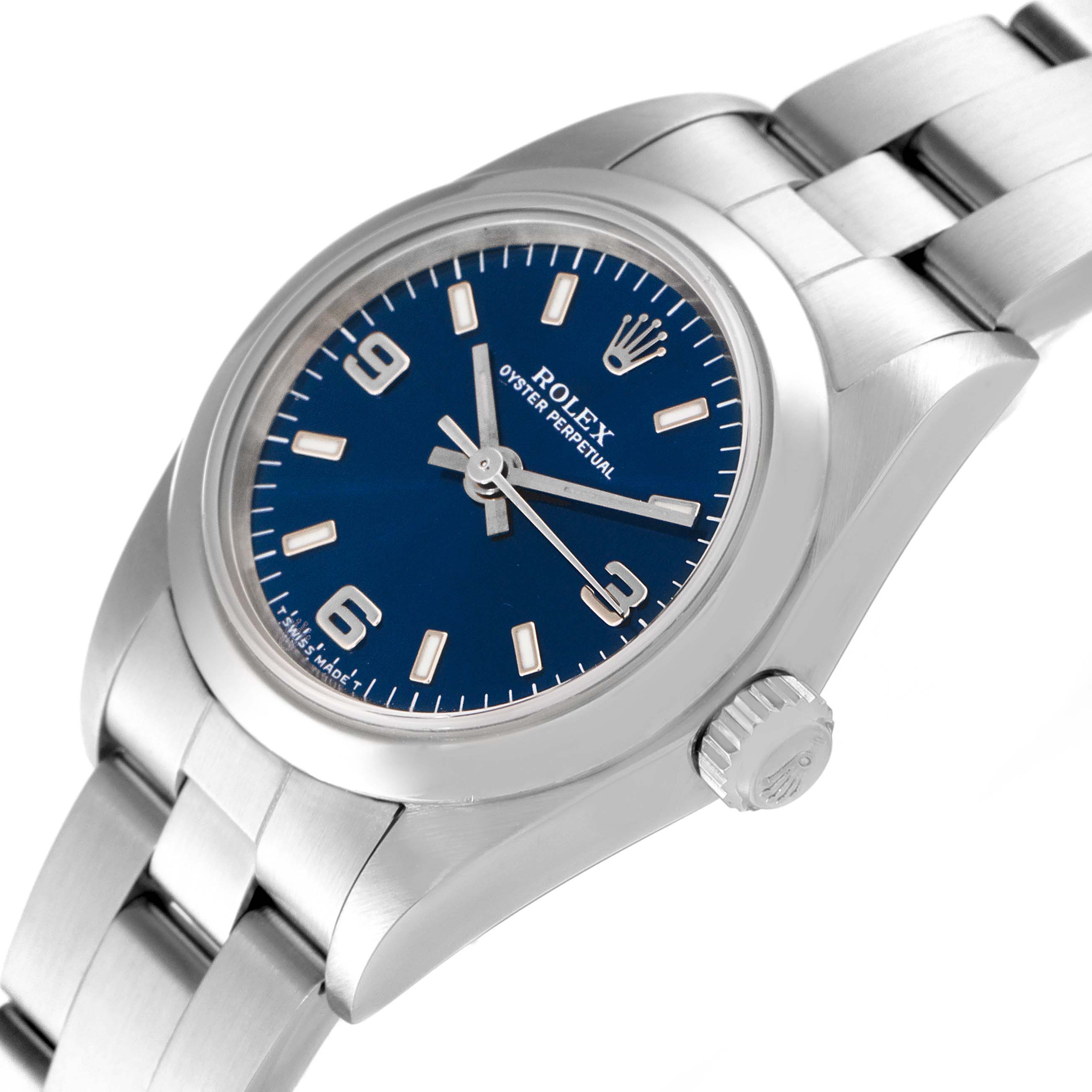 The image shows a Rolex Oyster Perpetual 76080 Women's Stainless Steel Blue Dial 76080 Women's Stainless Steel Blue Dial watch angled to display its face, case, and part of the bracelet.
