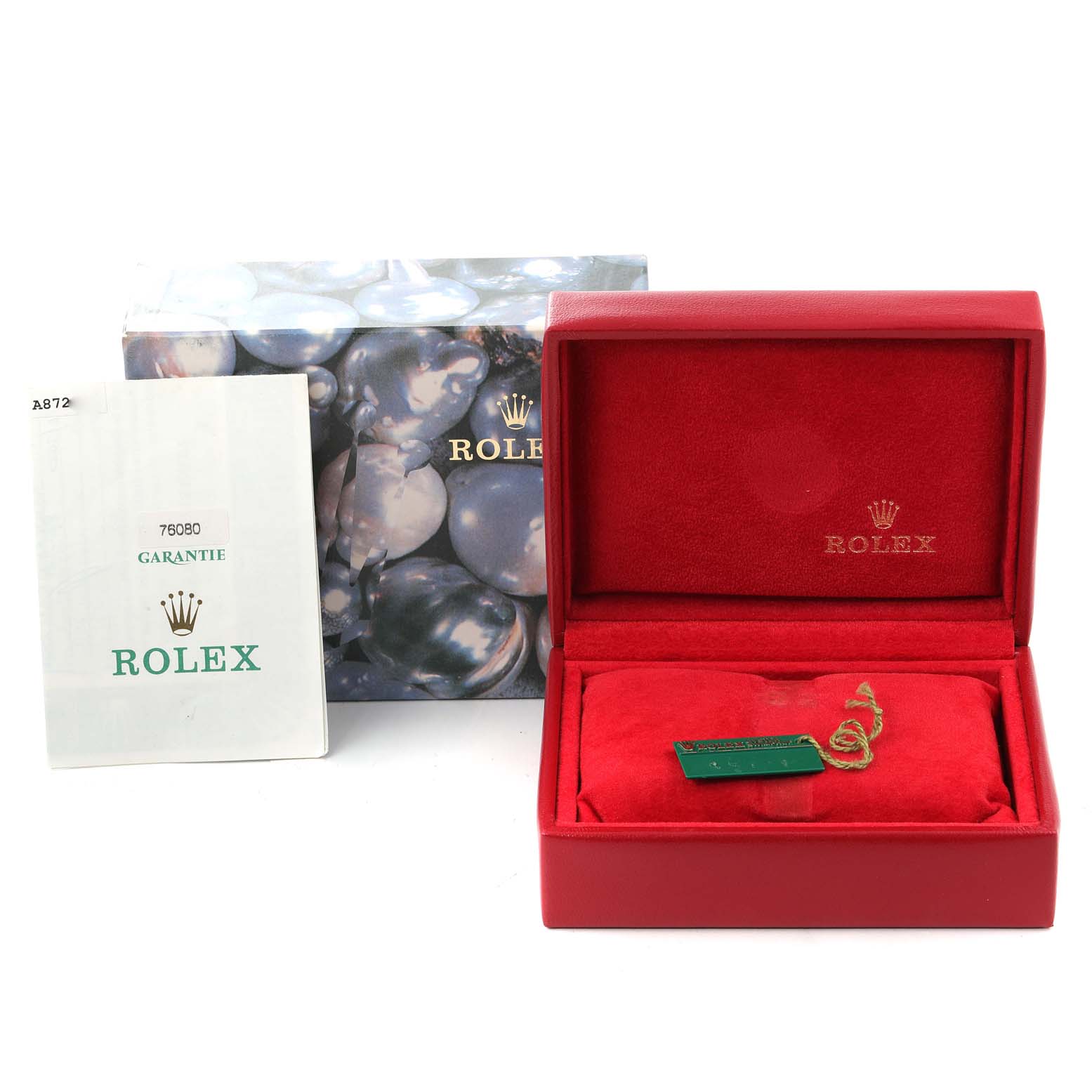 The image shows a Rolex Oyster Perpetual 76080 Women's Stainless Steel Blue Dial 76080 Women's Stainless Steel Blue Dial watch box and warranty card, with the box open revealing its red interior.