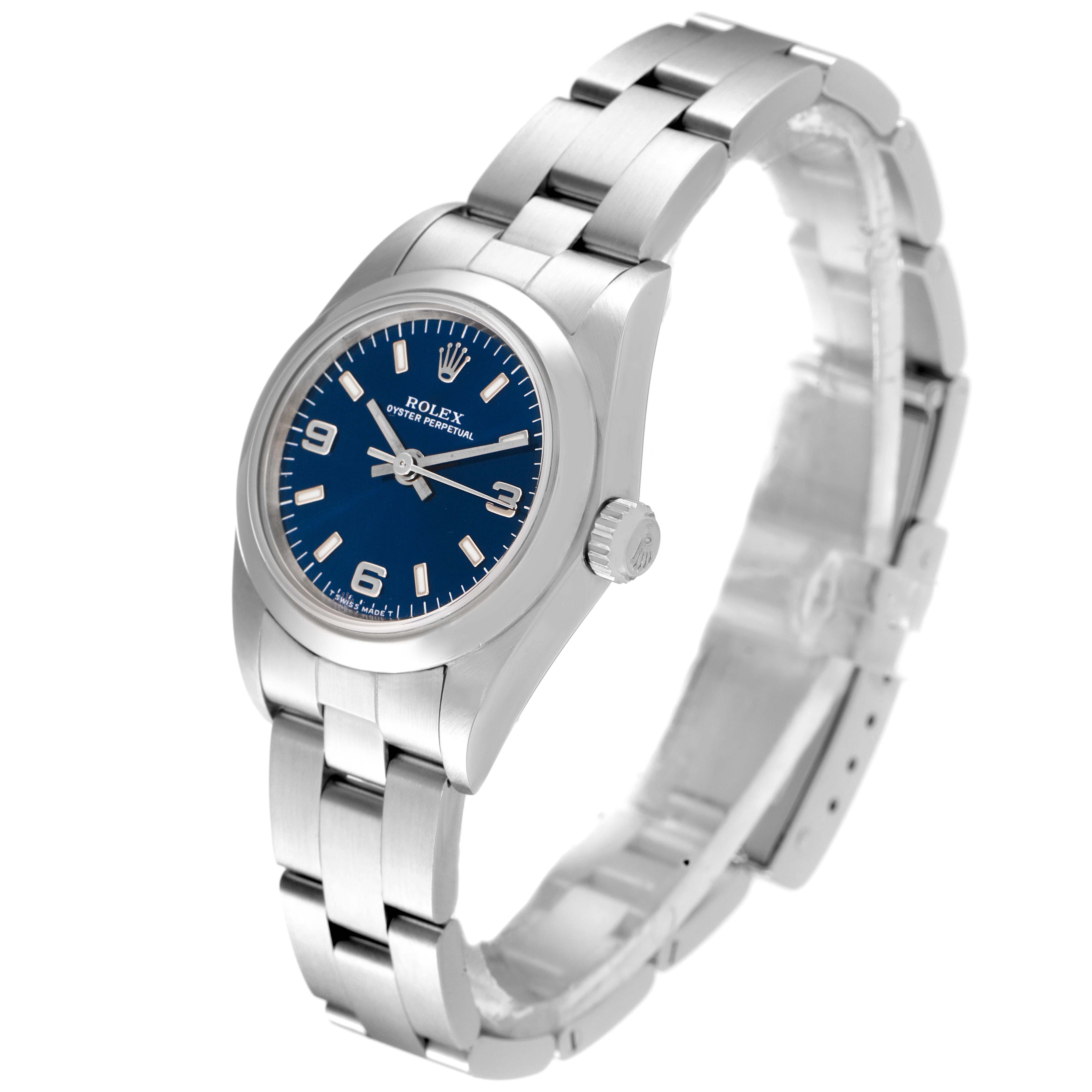 The Oyster Perpetual Rolex watch is shown at a slight angle displaying the face, crown, and bracelet.
